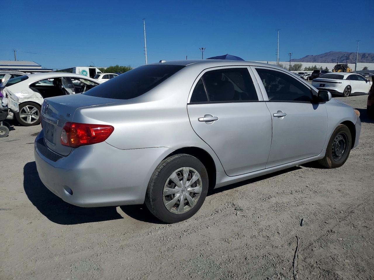 2010 Toyota Corolla Le Silver vin: JTDBU4EE9AJ067023