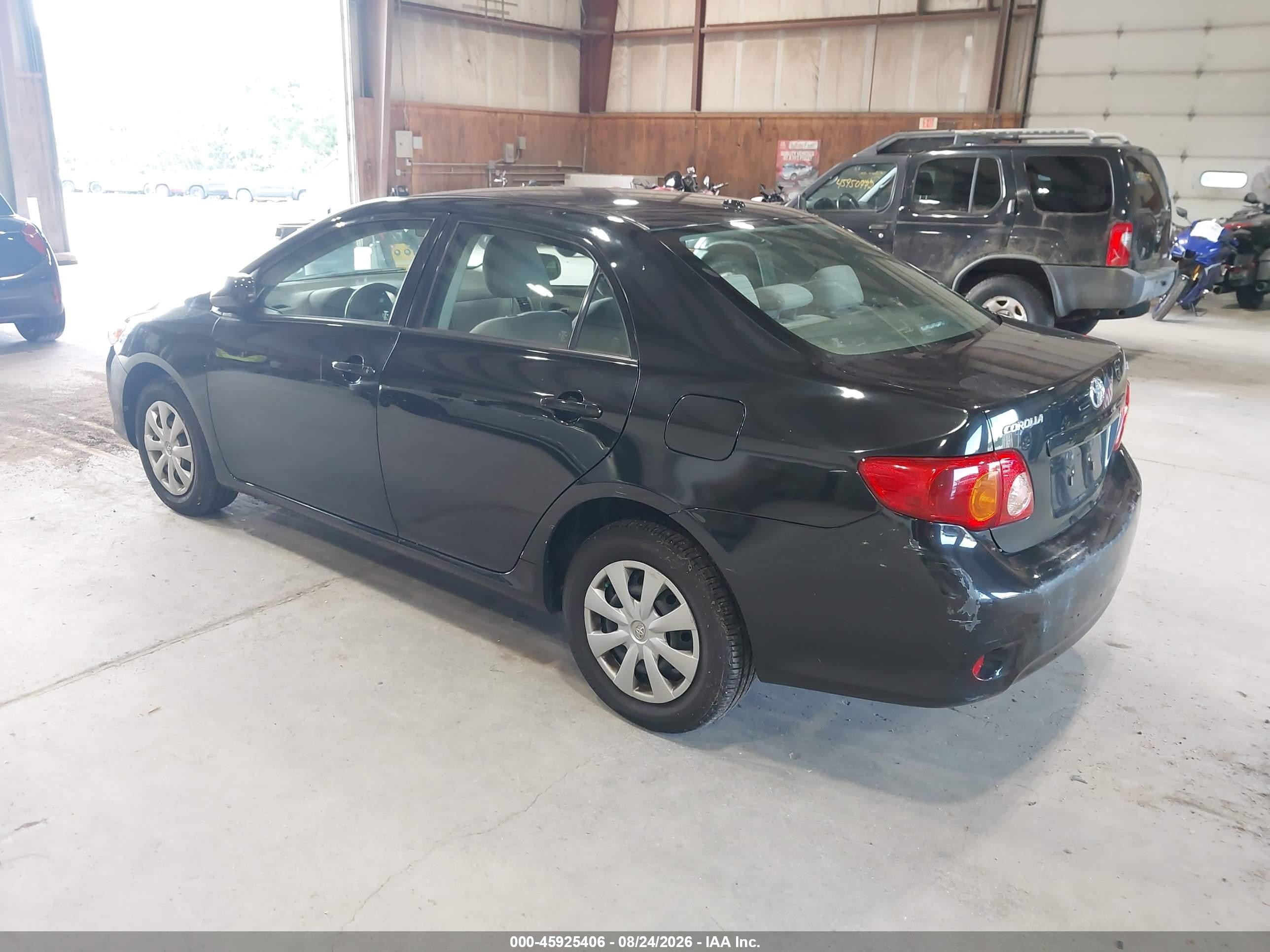 2010 Toyota Corolla Le Black vin: JTDBU4EE9AJ080015