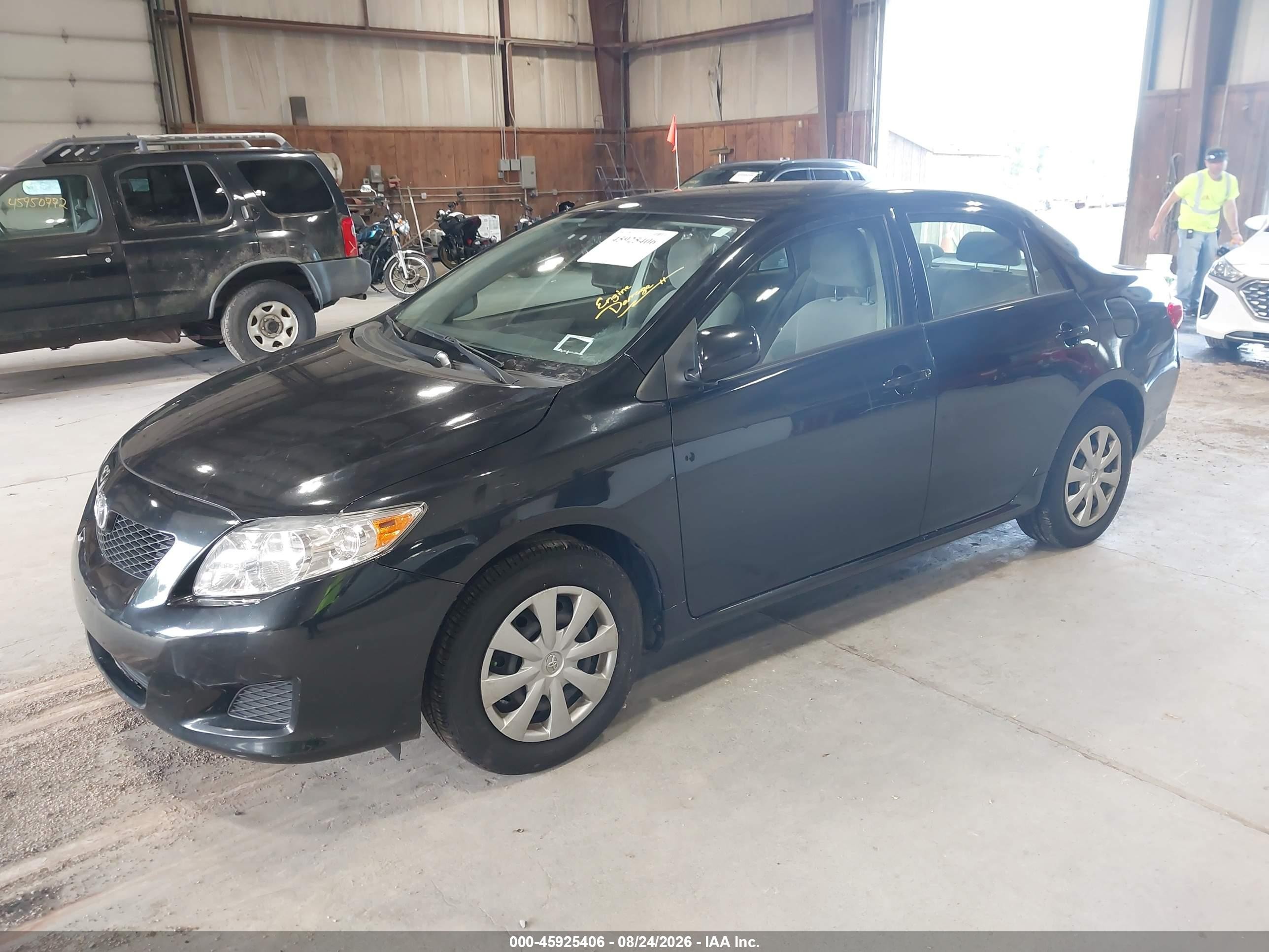 2010 Toyota Corolla Le Black vin: JTDBU4EE9AJ080015