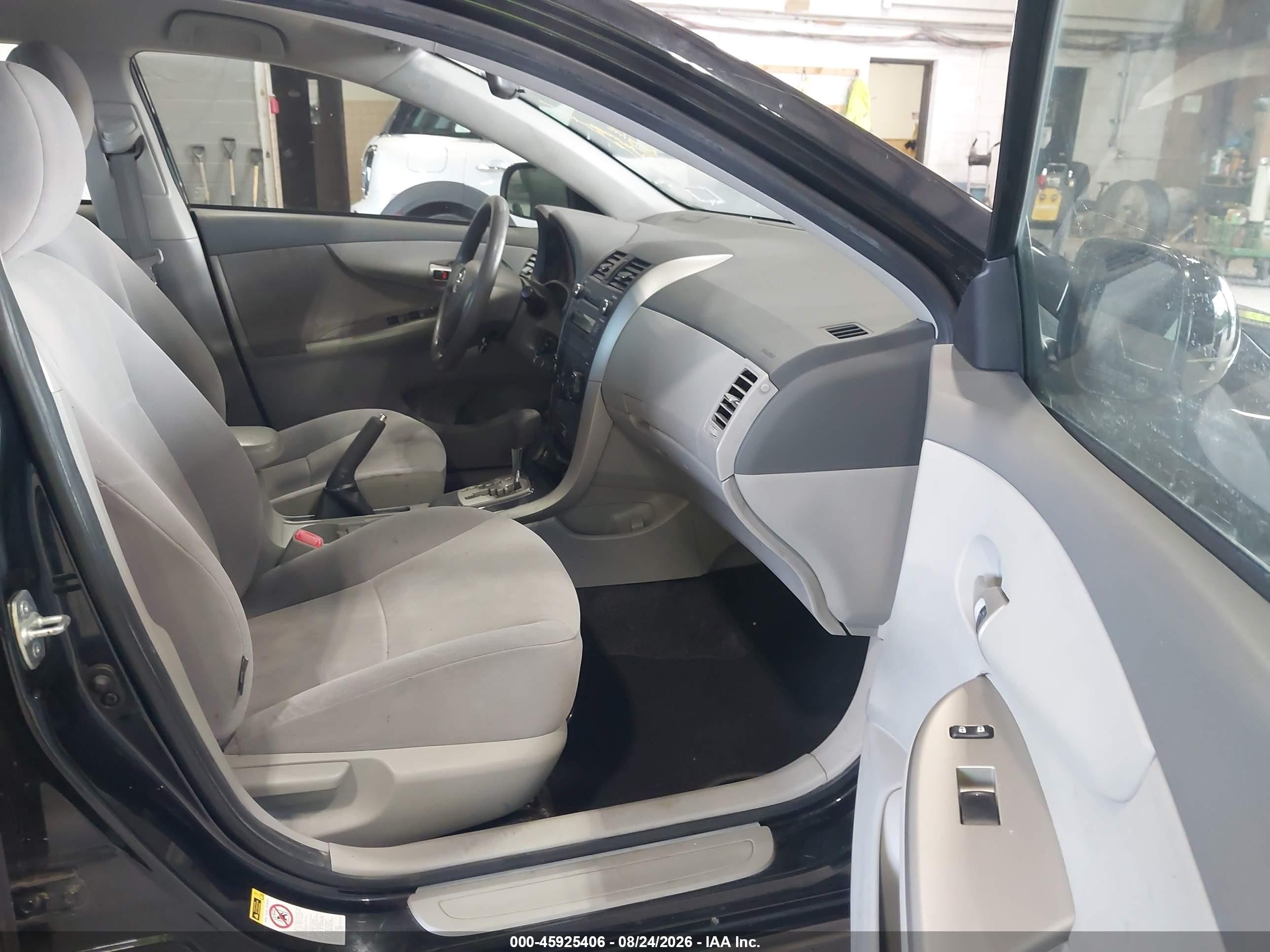 2010 Toyota Corolla Le Black vin: JTDBU4EE9AJ080015
