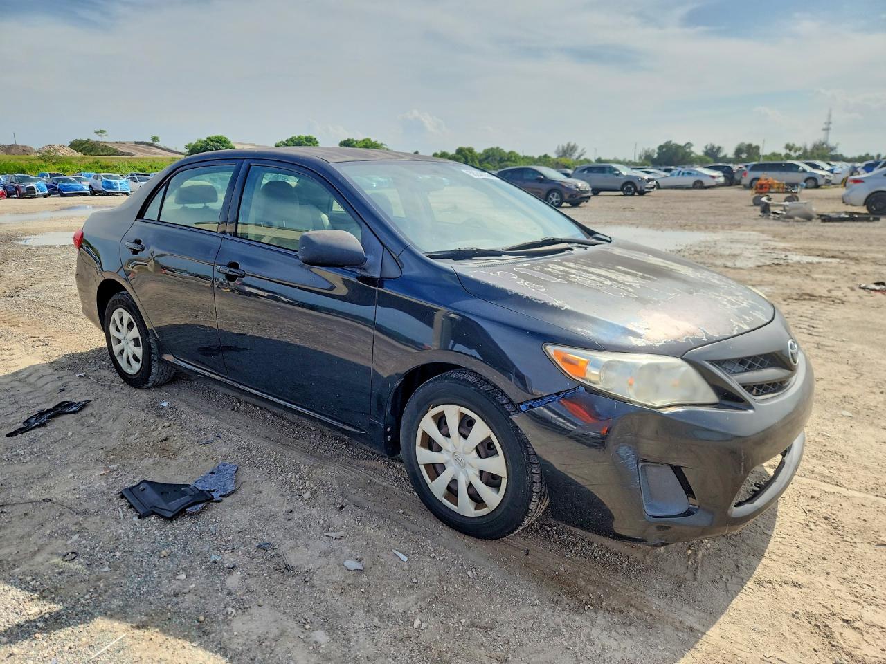 2011 Toyota Corolla Le Black vin: JTDBU4EE9B9131483