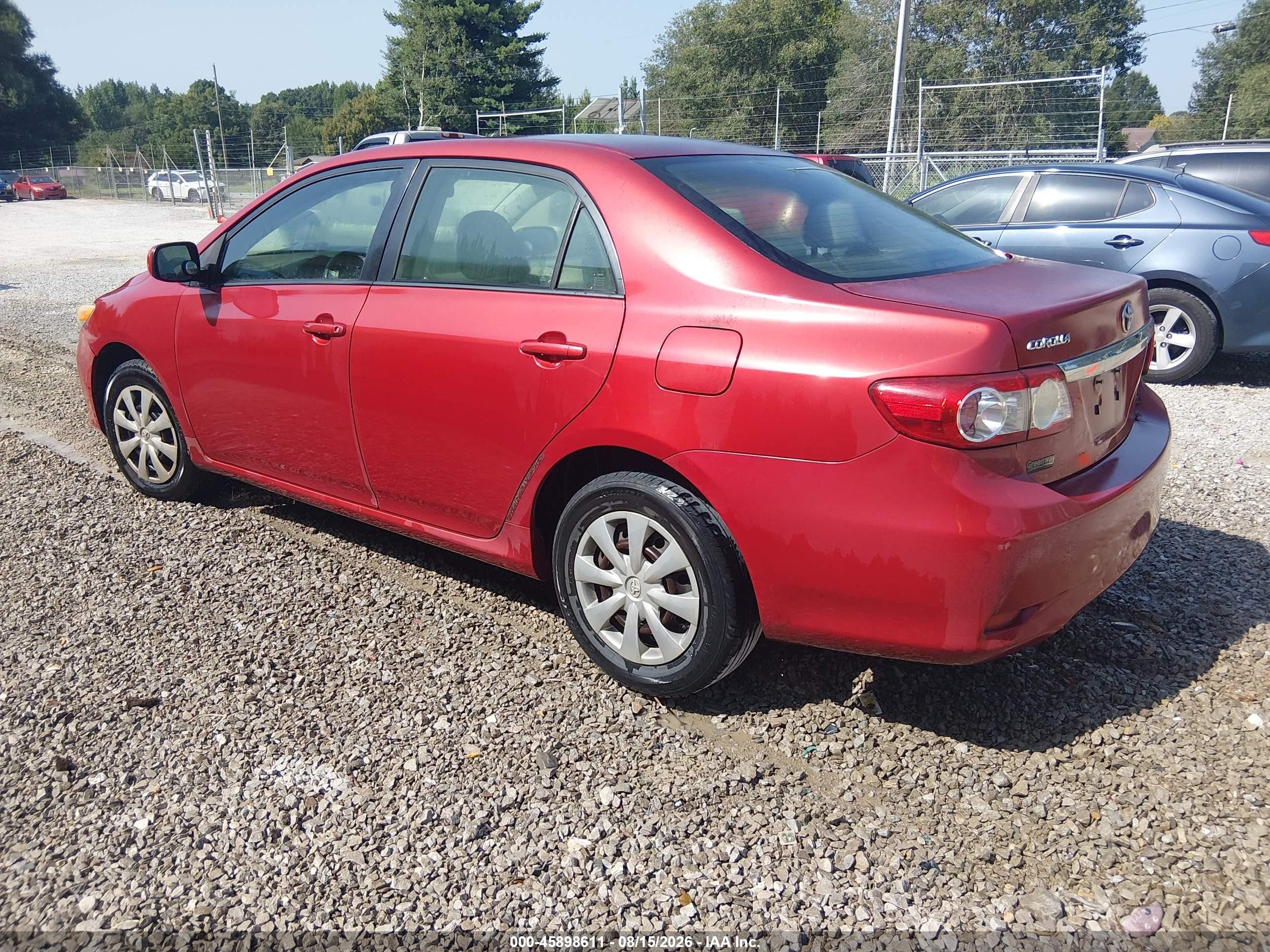 2011 Toyota Corolla Le Red vin: JTDBU4EE9B9156822
