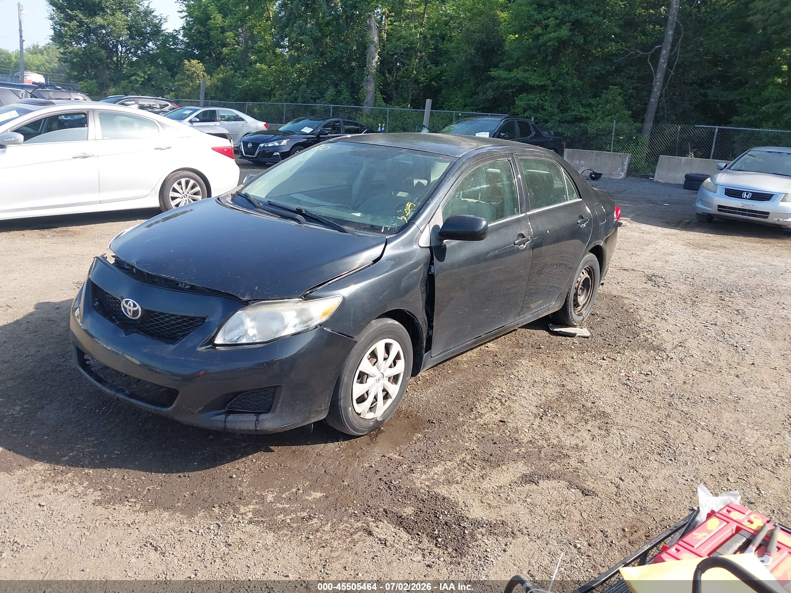 2010 Toyota Corolla Le Black vin: JTDBU4EEXAJ059156