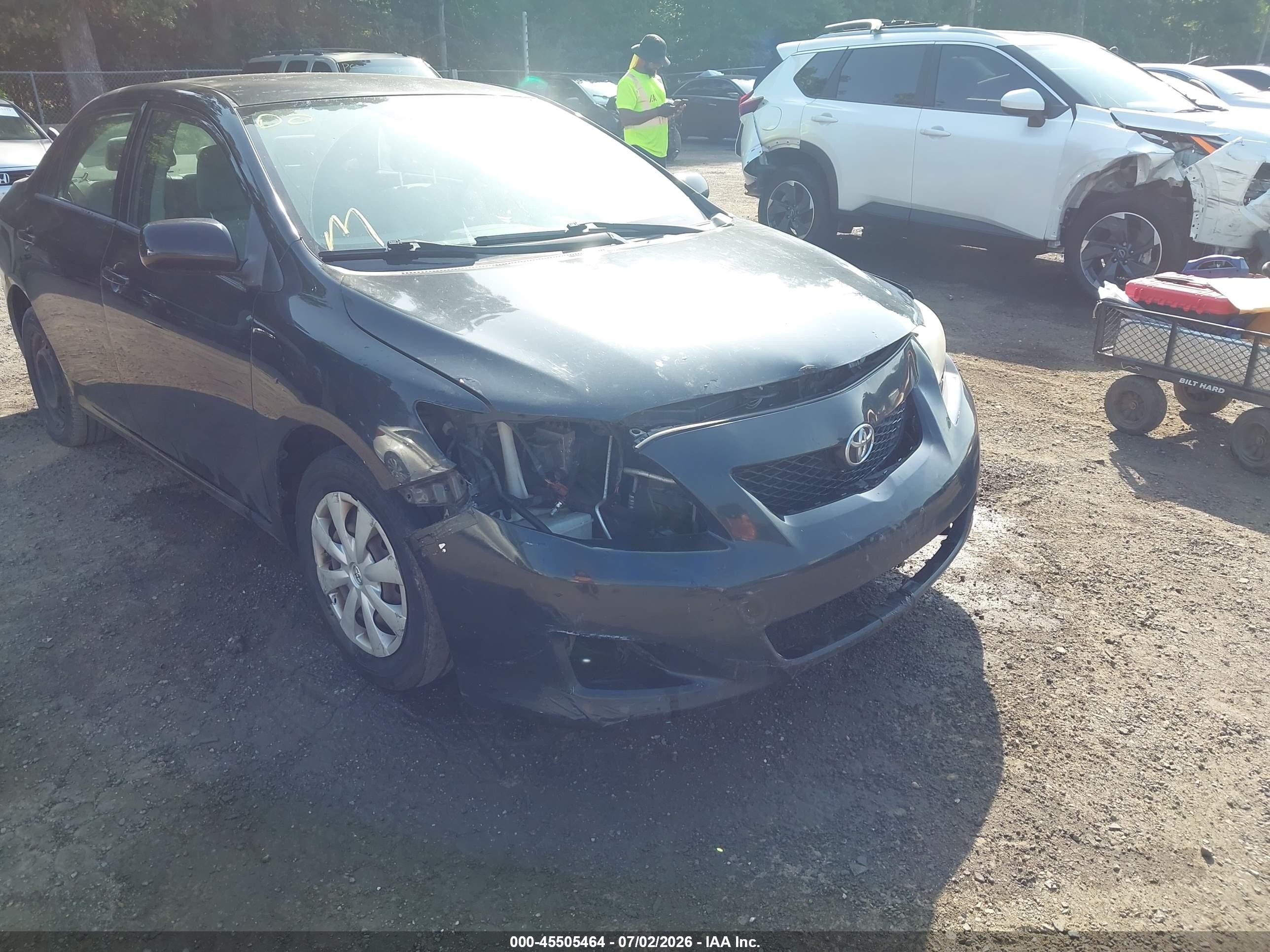 2010 Toyota Corolla Le Black vin: JTDBU4EEXAJ059156