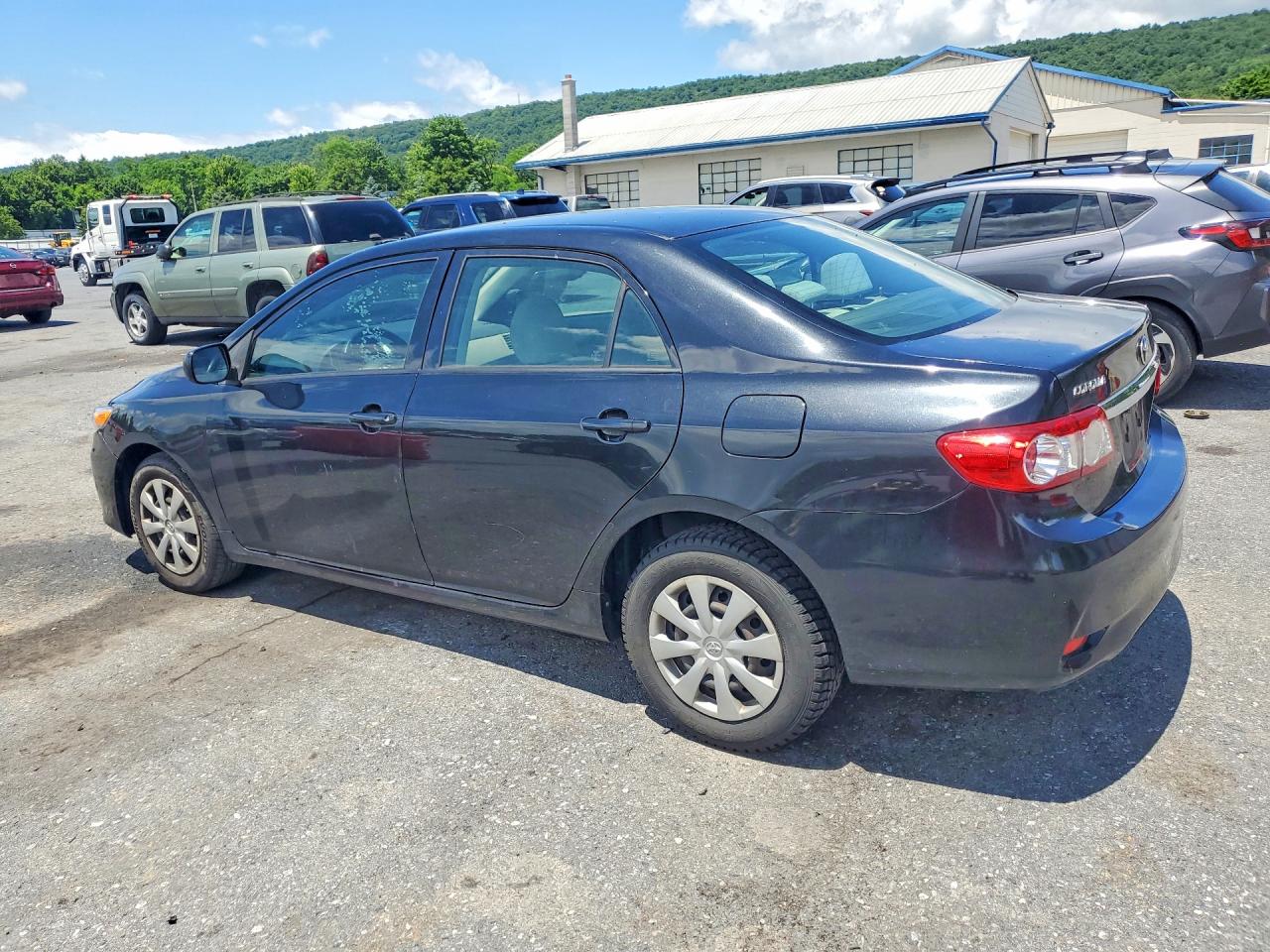2011 Toyota Corolla Base Black vin: JTDBU4EEXB9128561