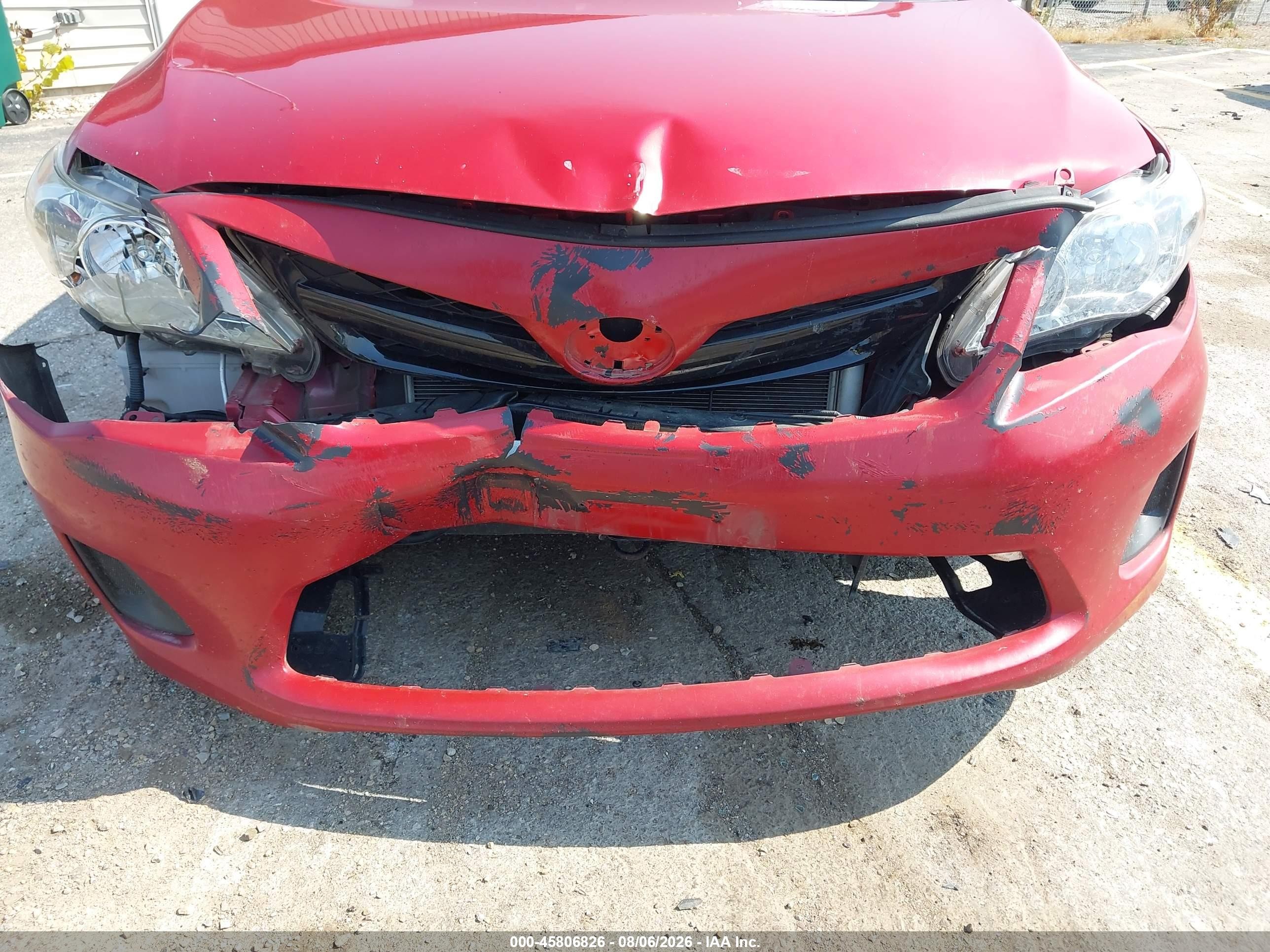2011 Toyota Corolla   Red vin: JTDBU4EEXB9144422