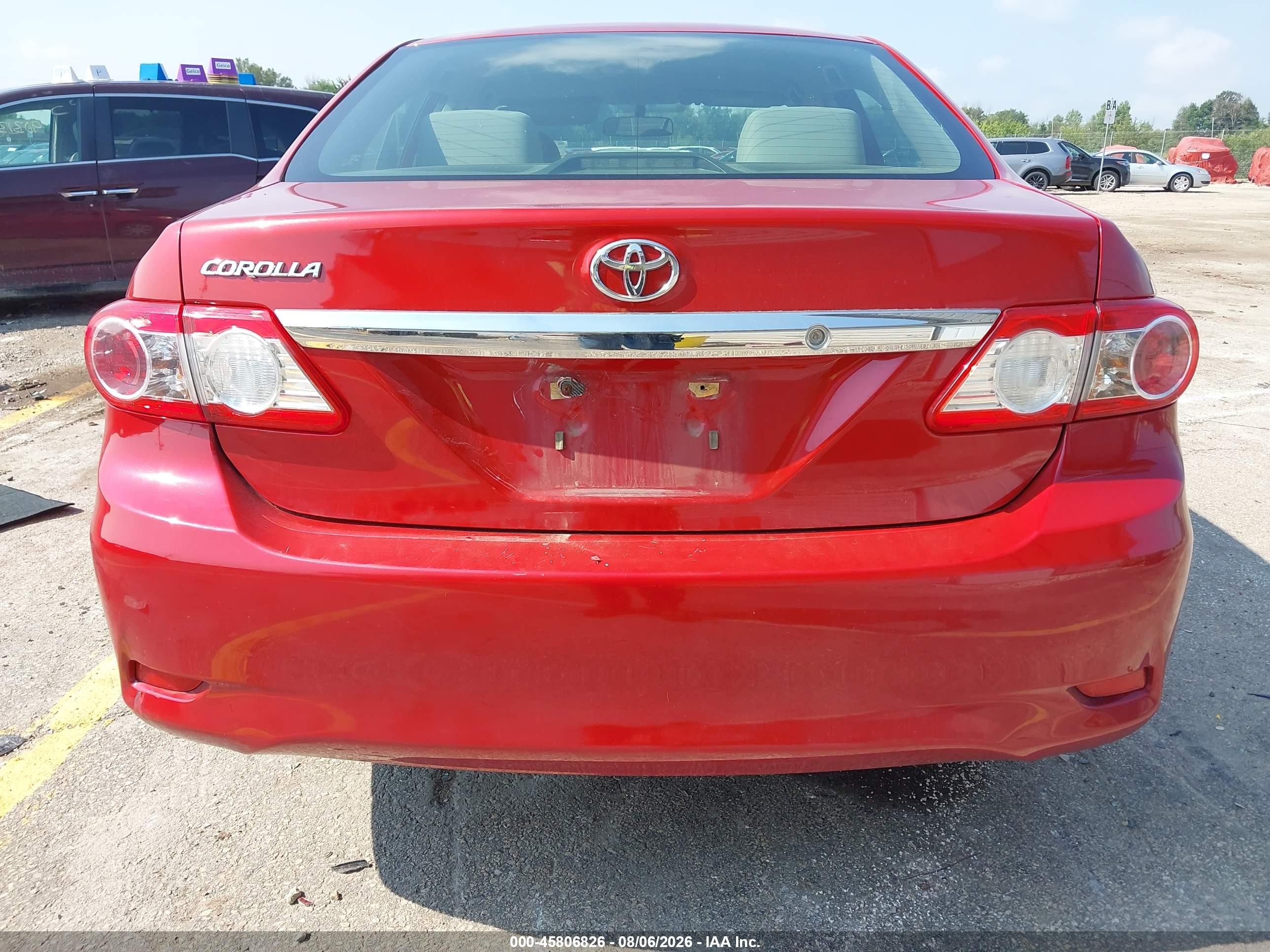 2011 Toyota Corolla   Red vin: JTDBU4EEXB9144422