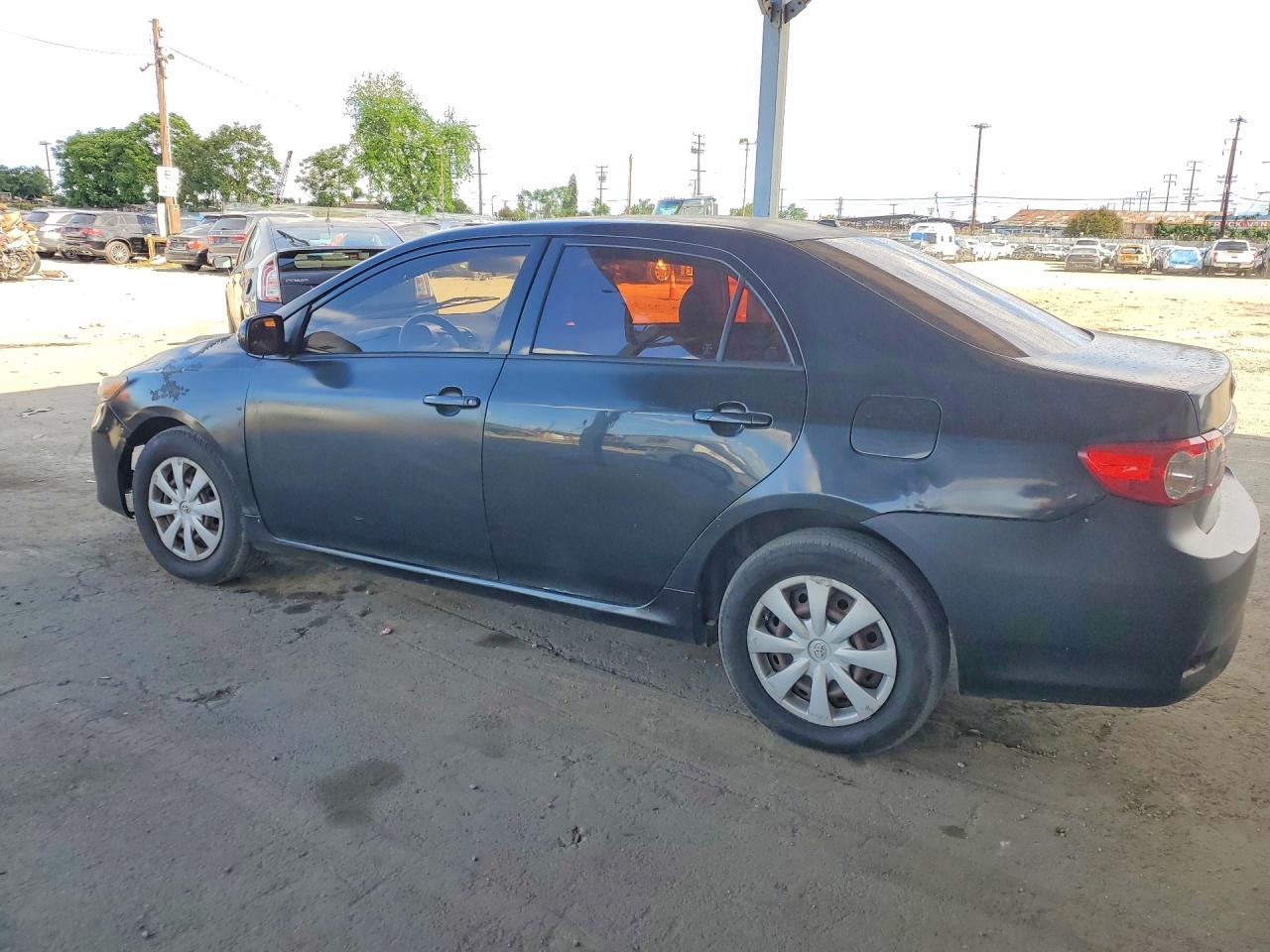 2011 Toyota Corolla Le Black vin: JTDBU4EEXB9149572