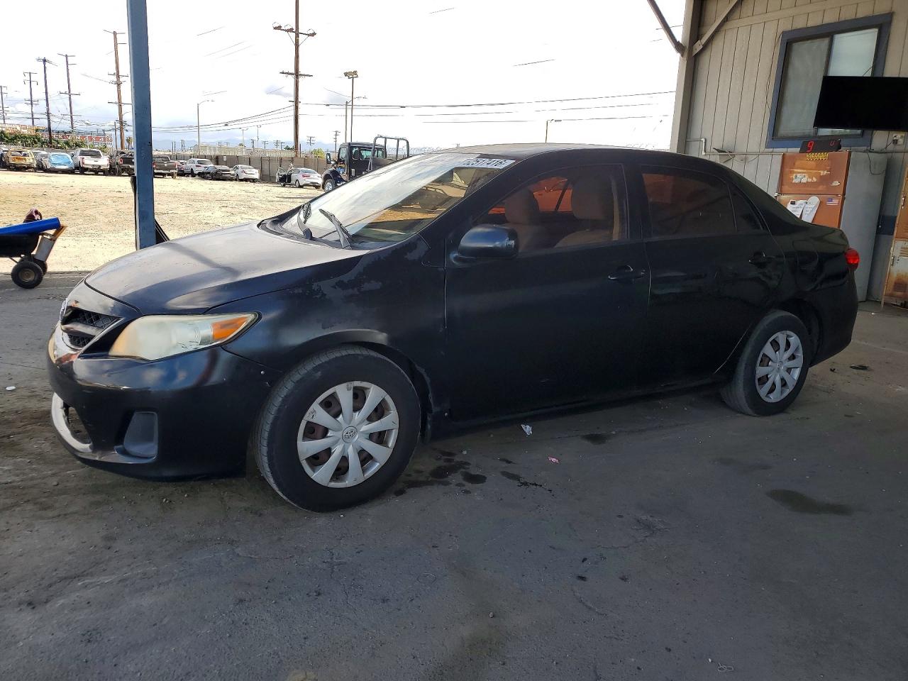 2011 Toyota Corolla Le Black vin: JTDBU4EEXB9149572
