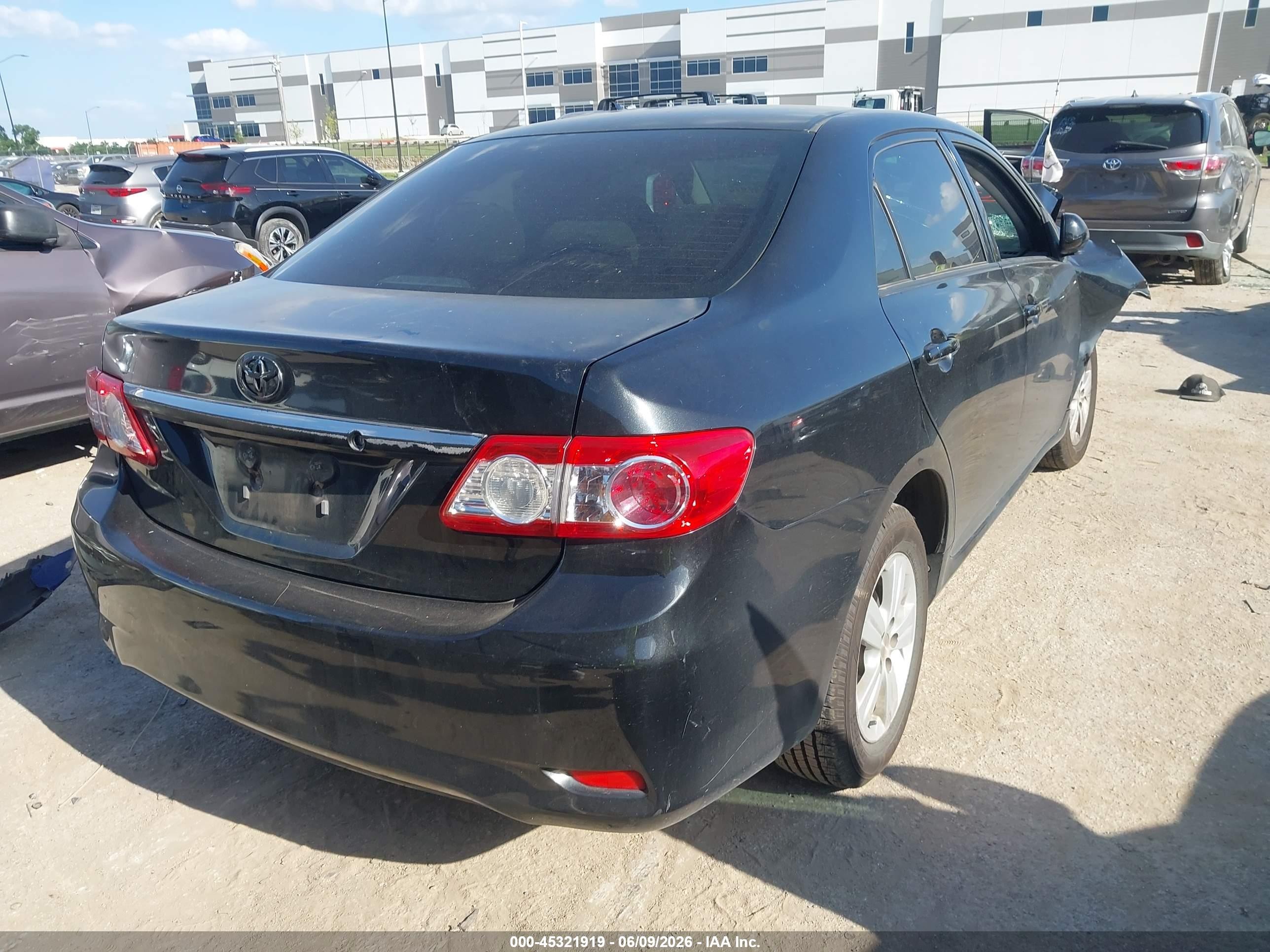 2011 Toyota Corolla Le Black vin: JTDBU4EEXB9159812