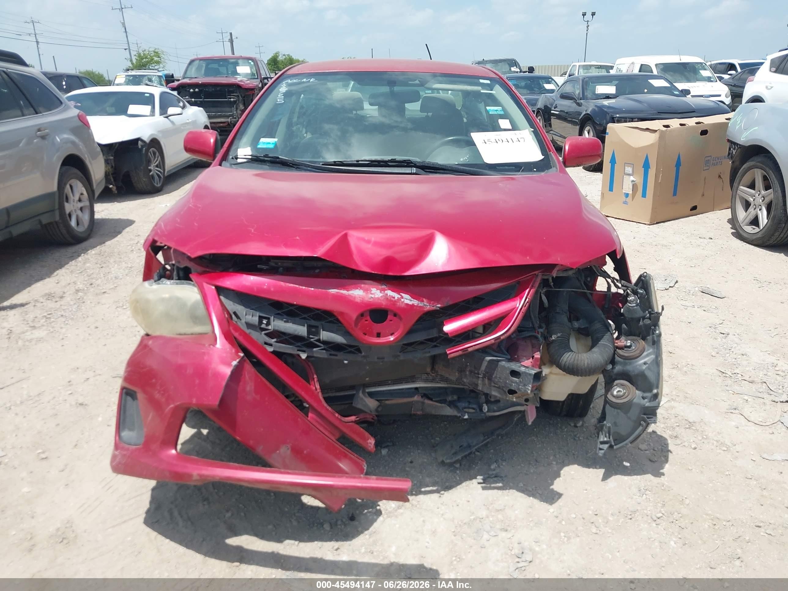 2011 Toyota Corolla Le Red vin: JTDBU4EEXB9160104