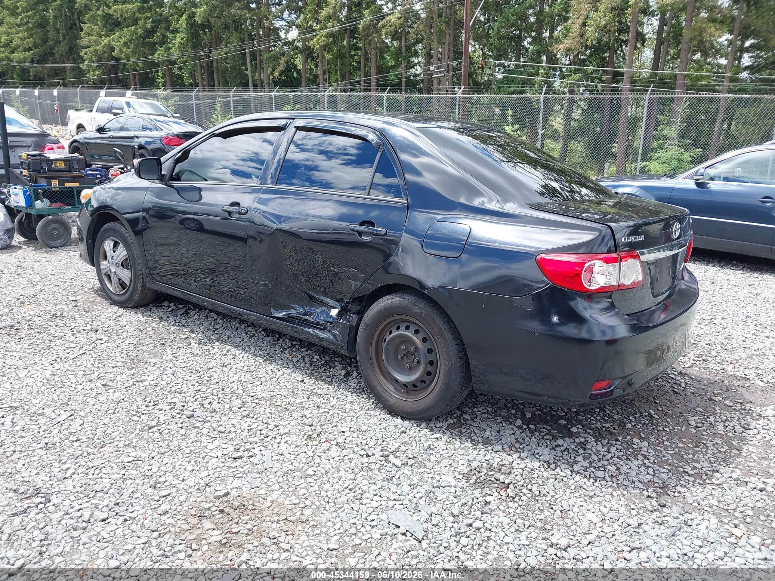 2011 Toyota Corolla Le Black vin: JTDBU4EEXB9162726