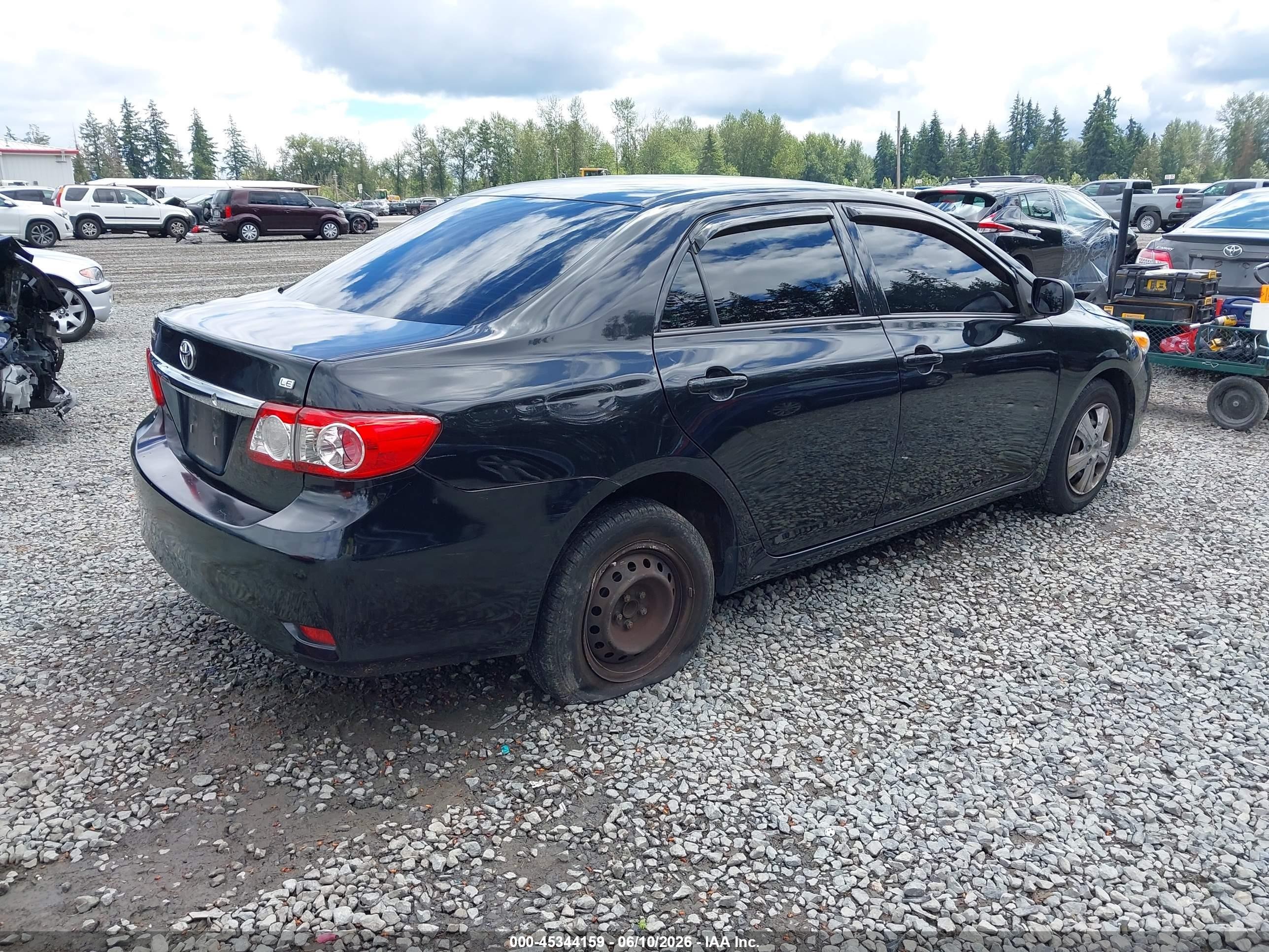 2011 Toyota Corolla Le Black vin: JTDBU4EEXB9162726