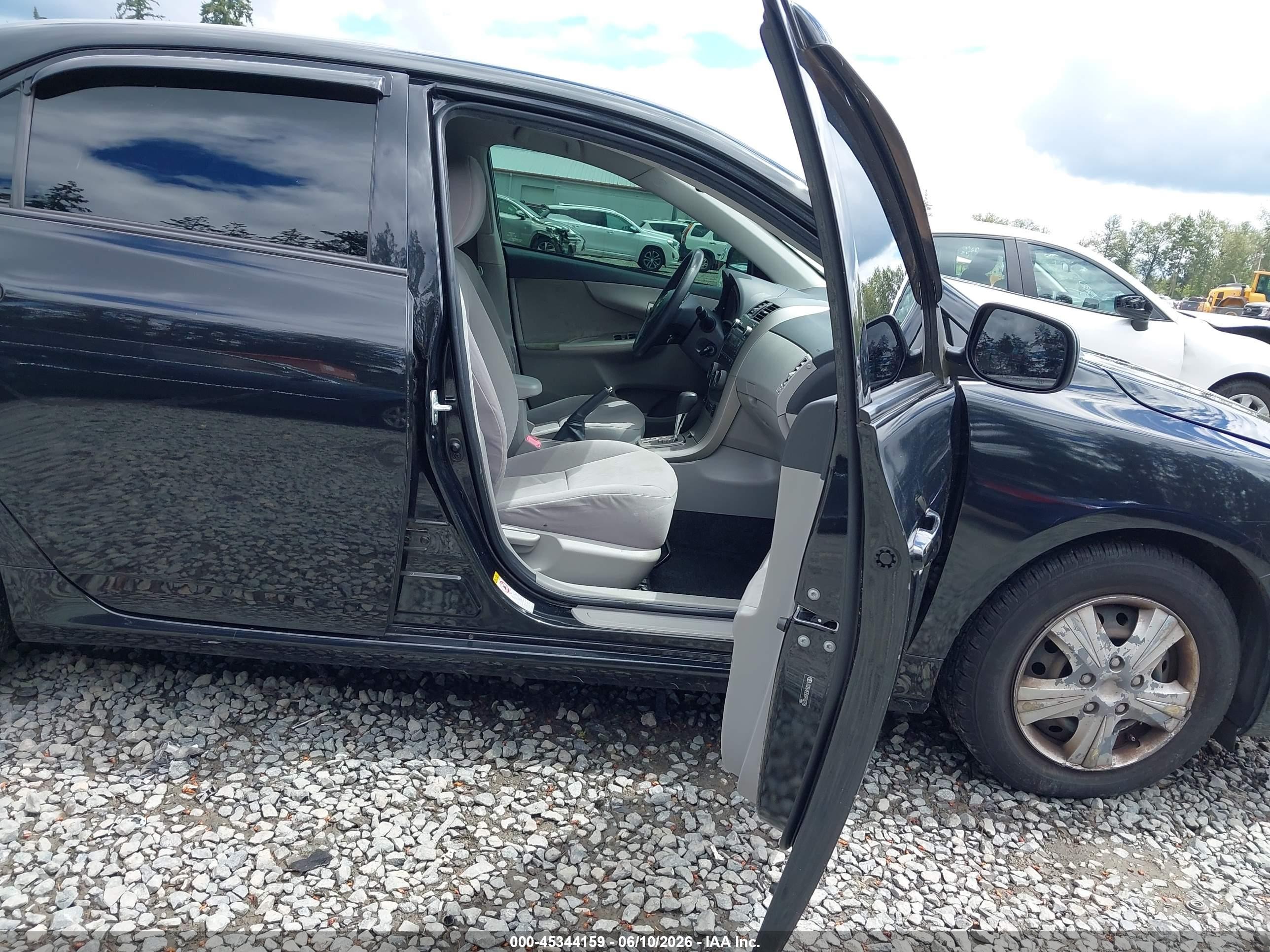 2011 Toyota Corolla Le Black vin: JTDBU4EEXB9162726