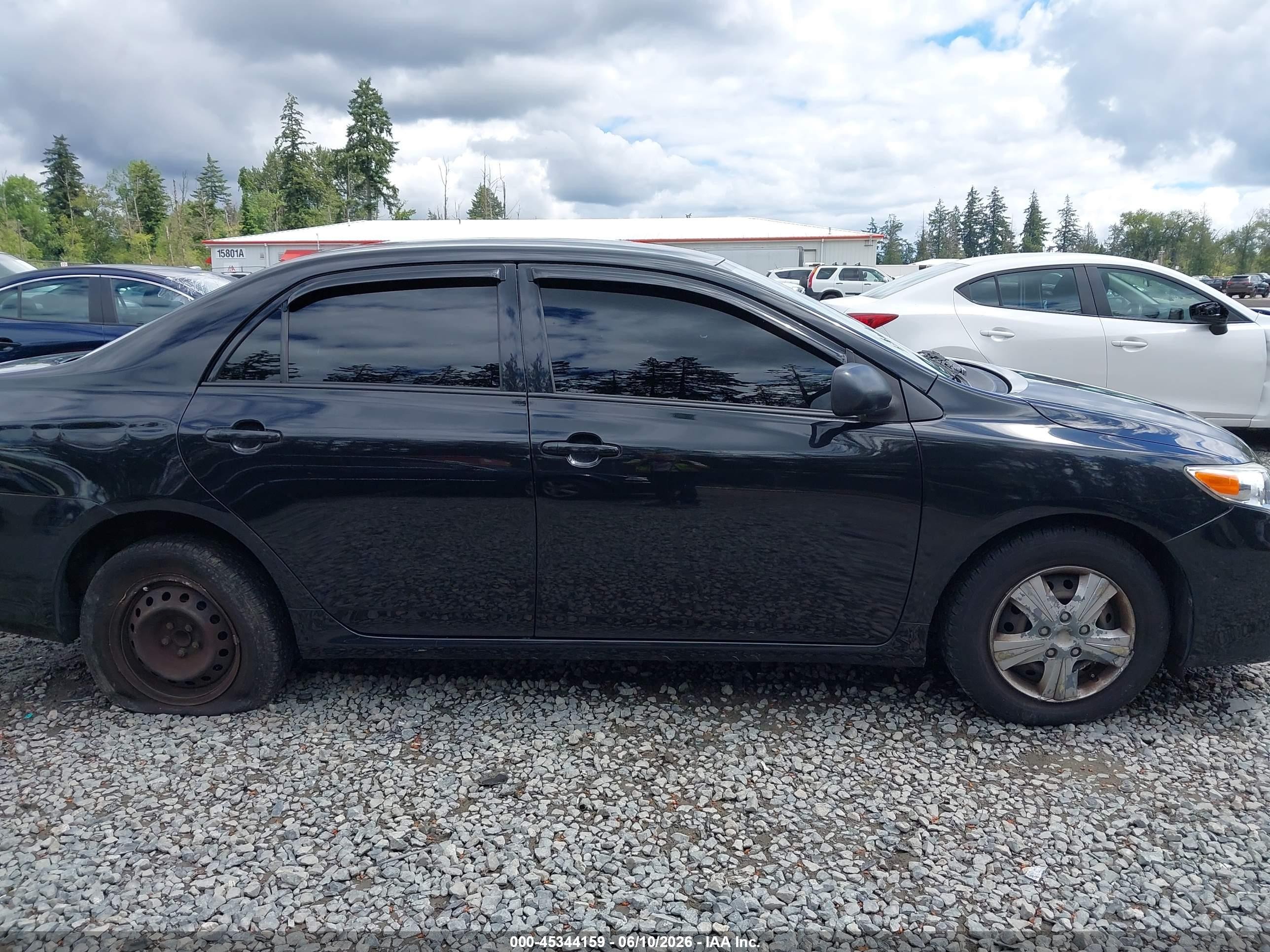 2011 Toyota Corolla Le Black vin: JTDBU4EEXB9162726