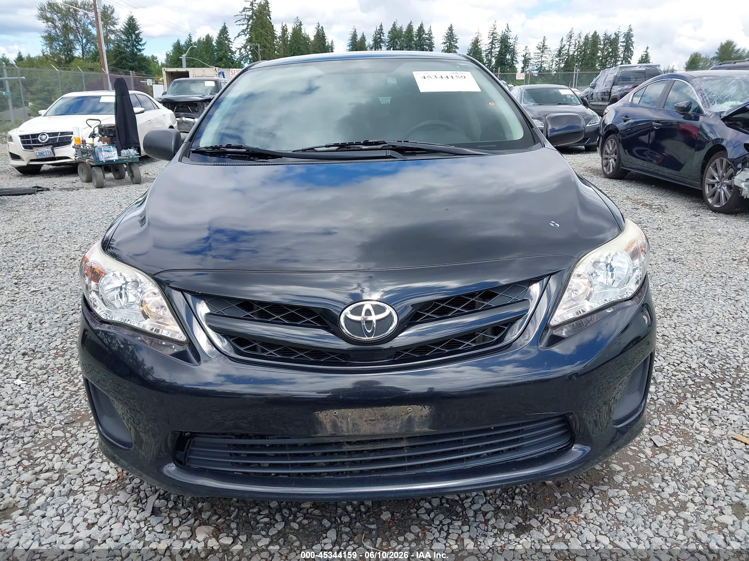 2011 Toyota Corolla Le Black vin: JTDBU4EEXB9162726