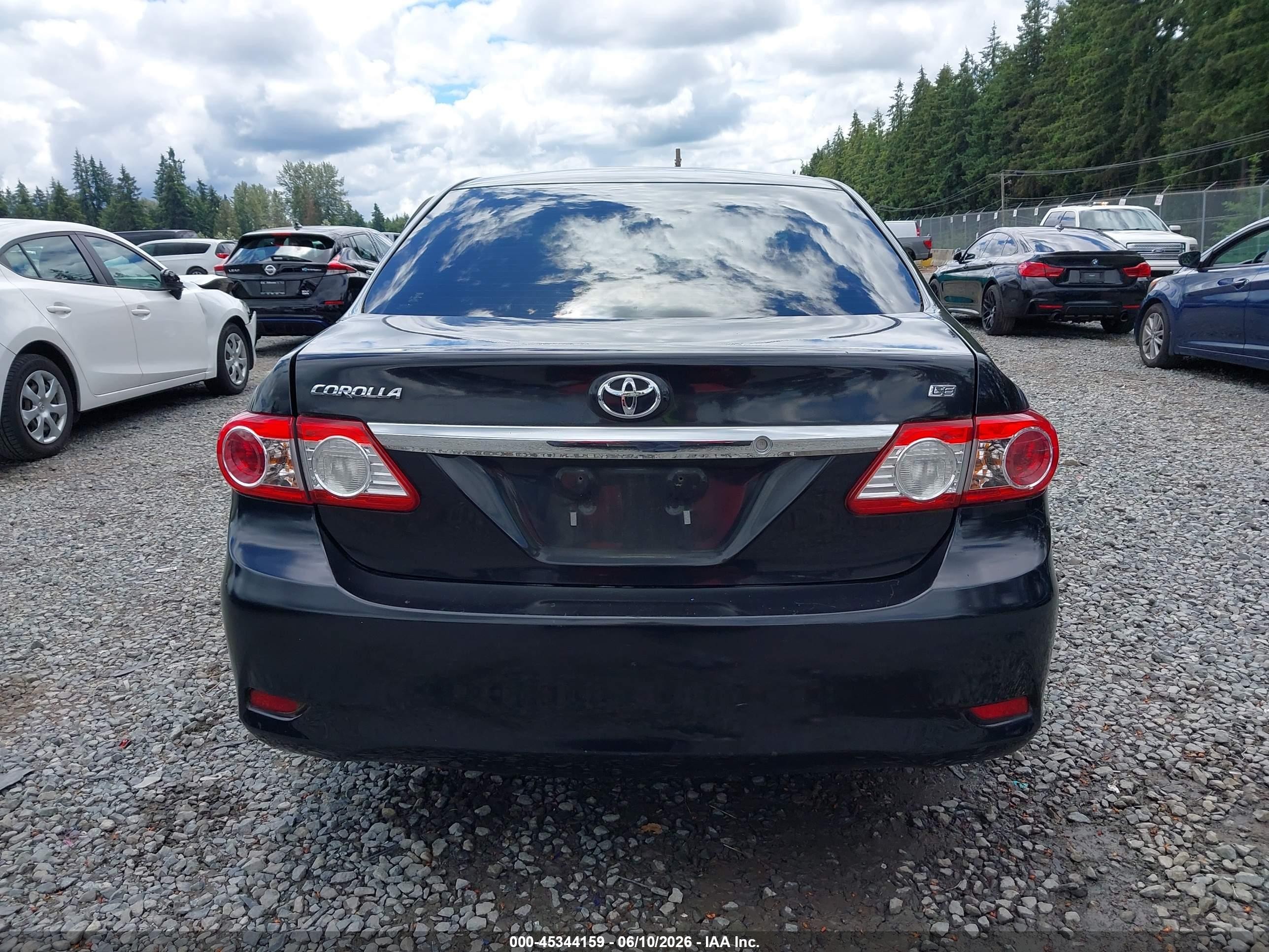 2011 Toyota Corolla Le Black vin: JTDBU4EEXB9162726