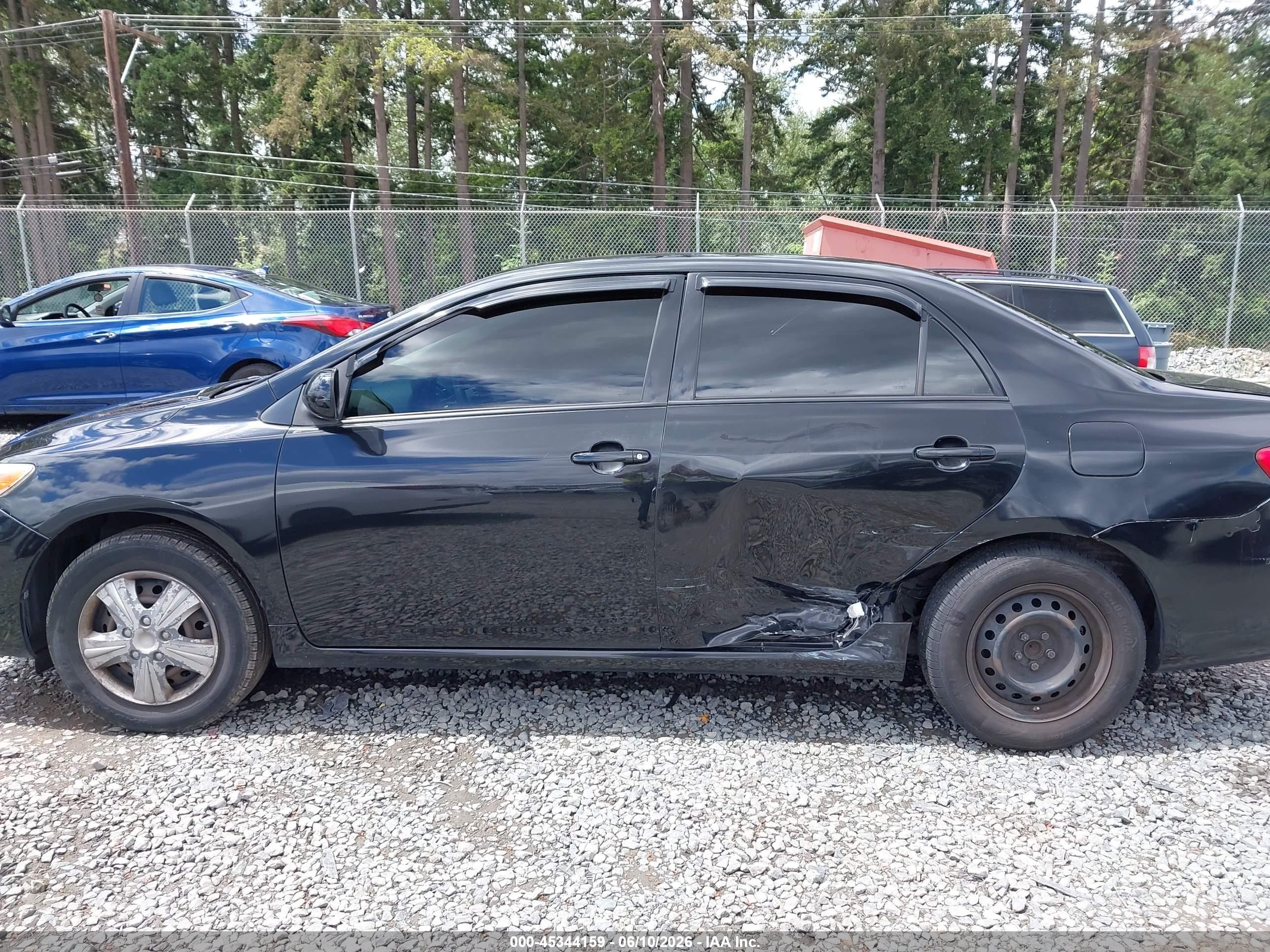 2011 Toyota Corolla Le Black vin: JTDBU4EEXB9162726