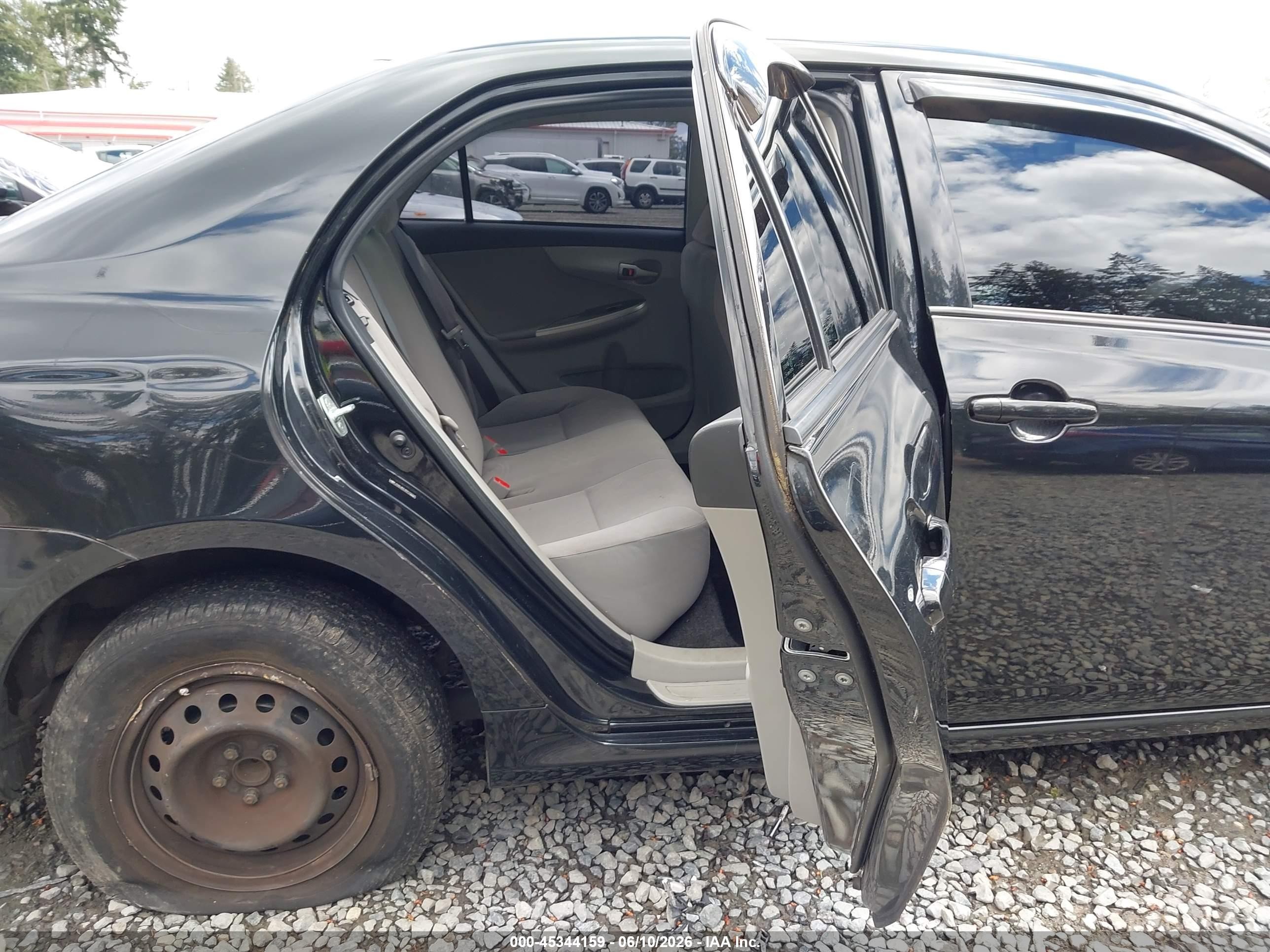 2011 Toyota Corolla Le Black vin: JTDBU4EEXB9162726