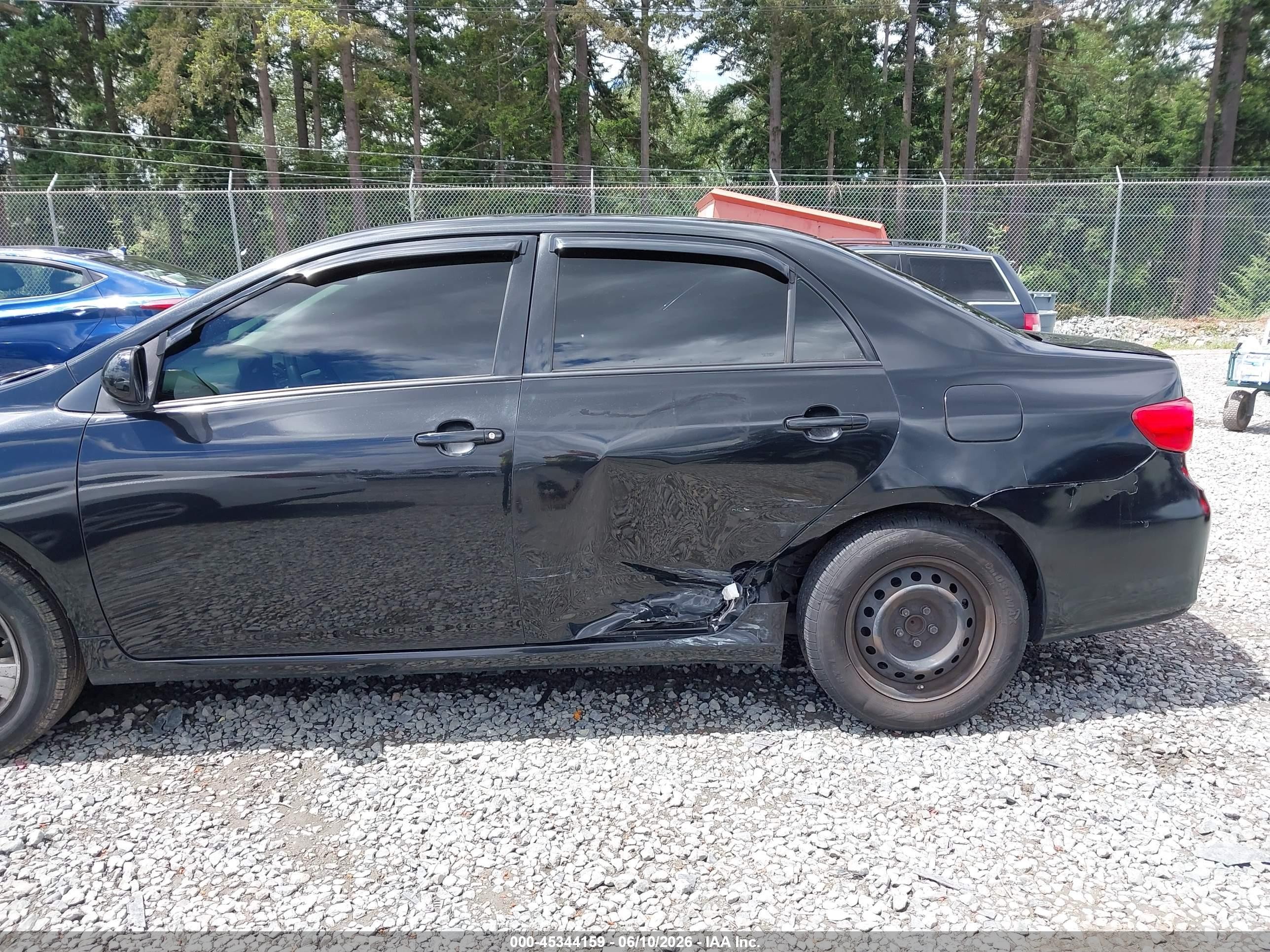 2011 Toyota Corolla Le Black vin: JTDBU4EEXB9162726