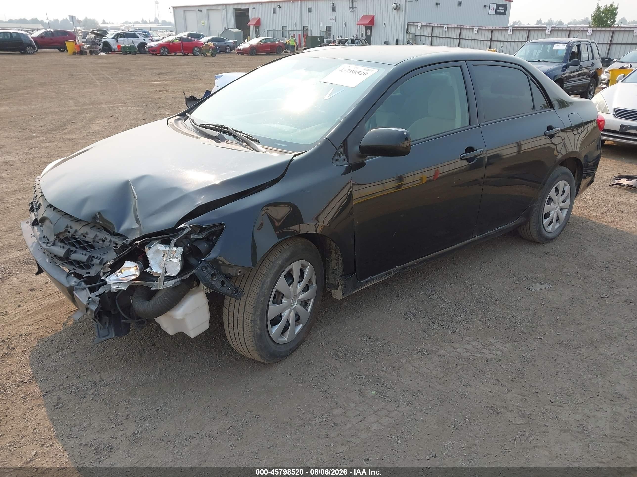 2011 Toyota Corolla Le Black vin: JTDBU4EEXB9164072