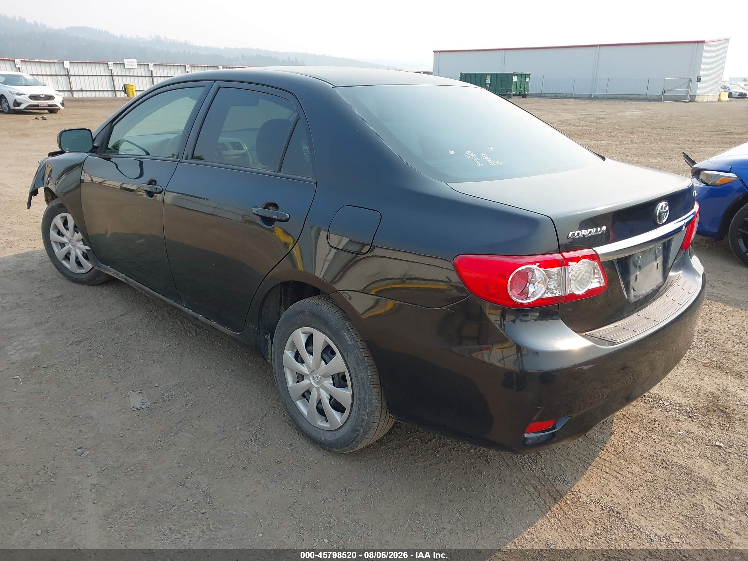 2011 Toyota Corolla Le Black vin: JTDBU4EEXB9164072