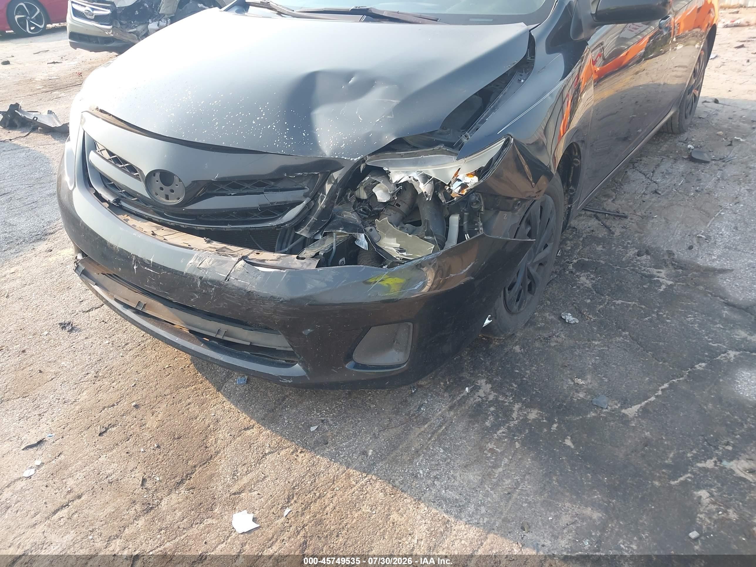 2011 Toyota Corolla Le Black vin: JTDBU4EEXBJ101570