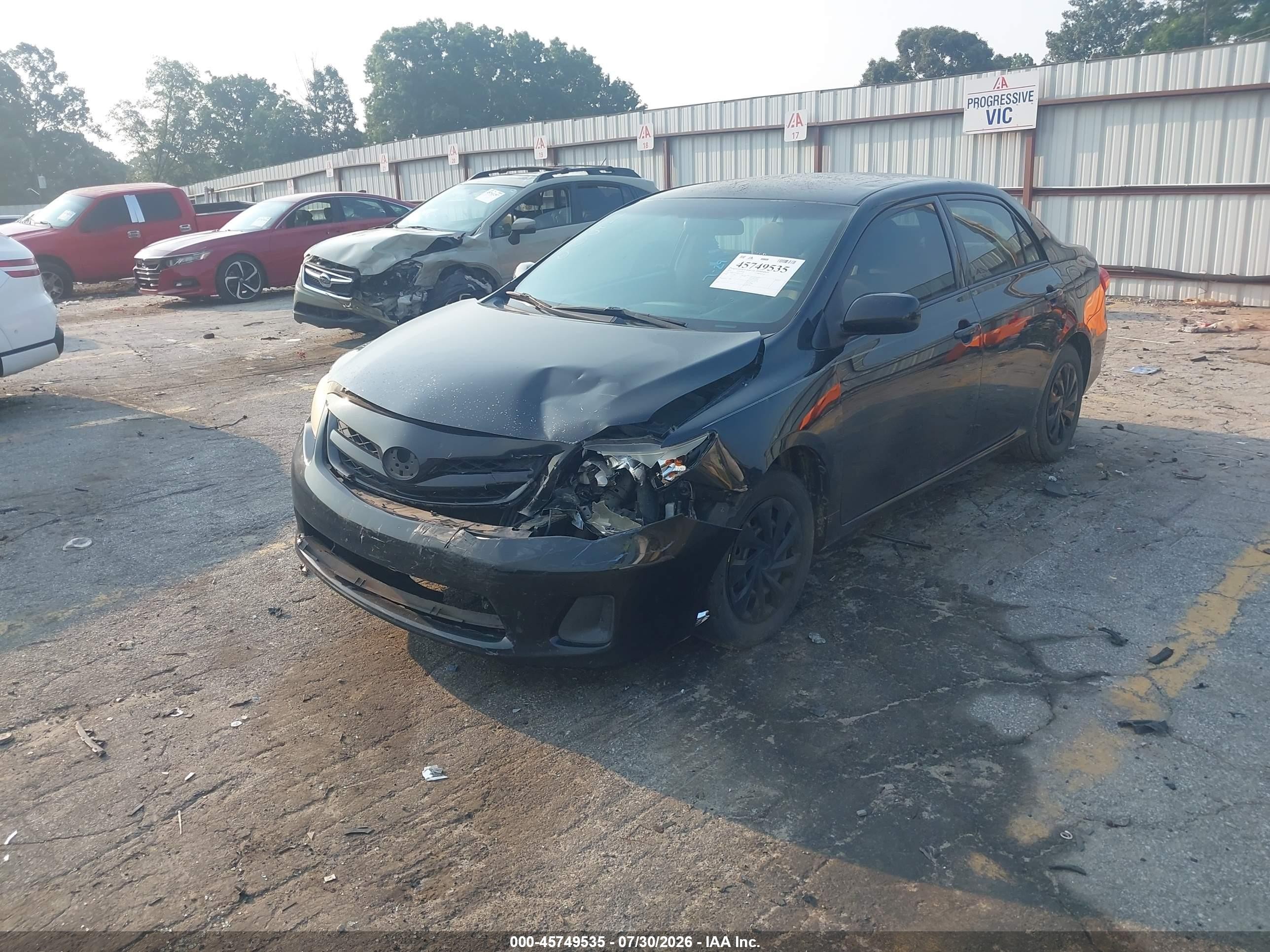 2011 Toyota Corolla Le Black vin: JTDBU4EEXBJ101570