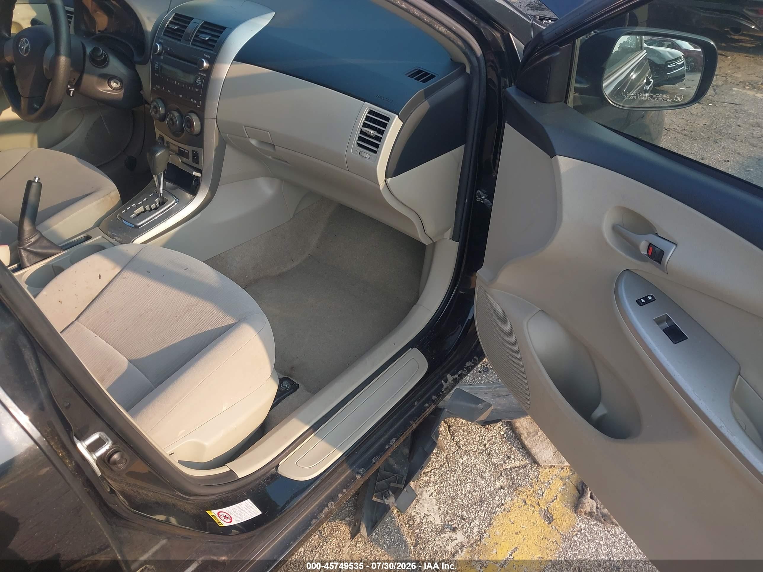 2011 Toyota Corolla Le Black vin: JTDBU4EEXBJ101570