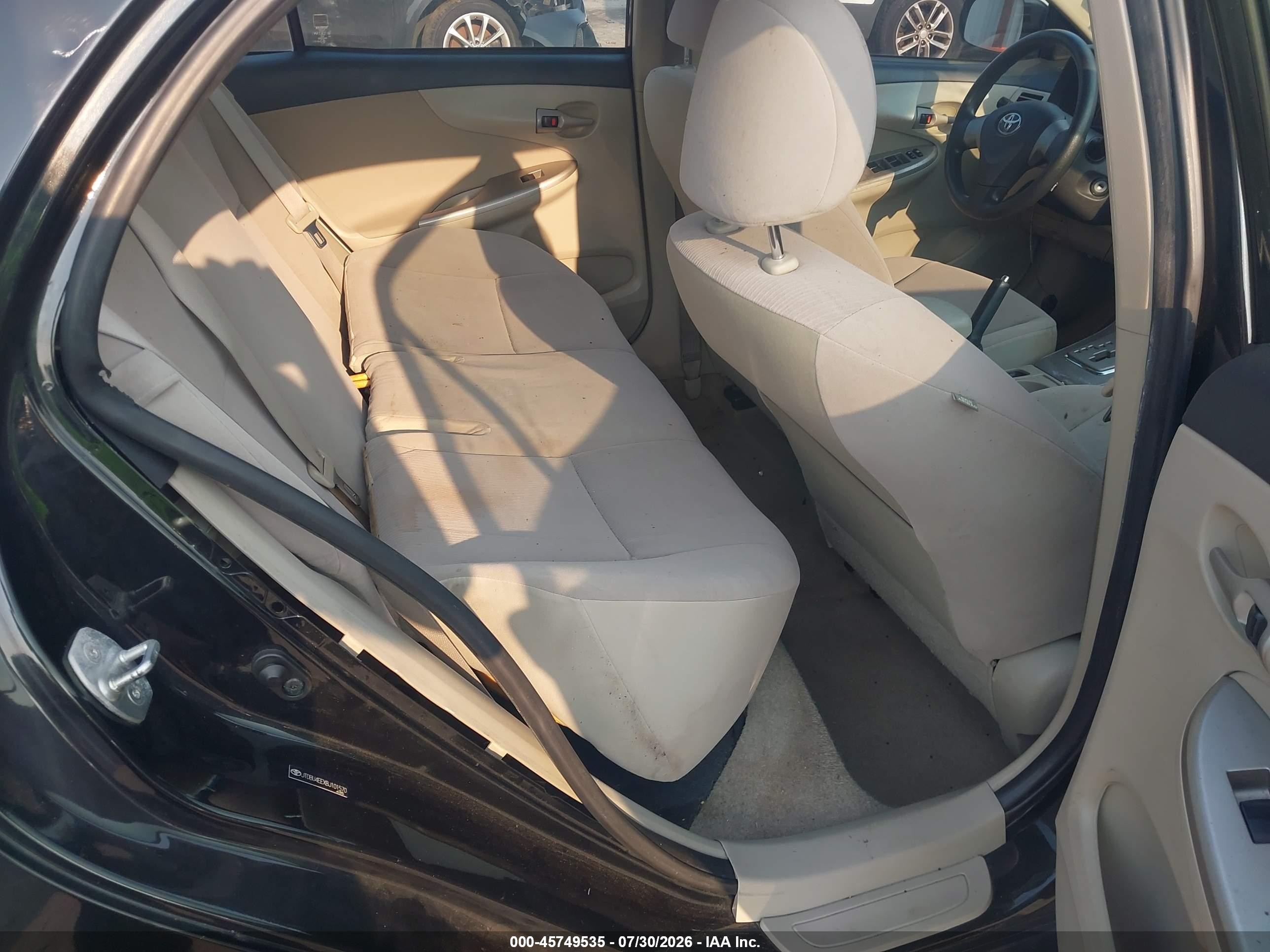 2011 Toyota Corolla Le Black vin: JTDBU4EEXBJ101570