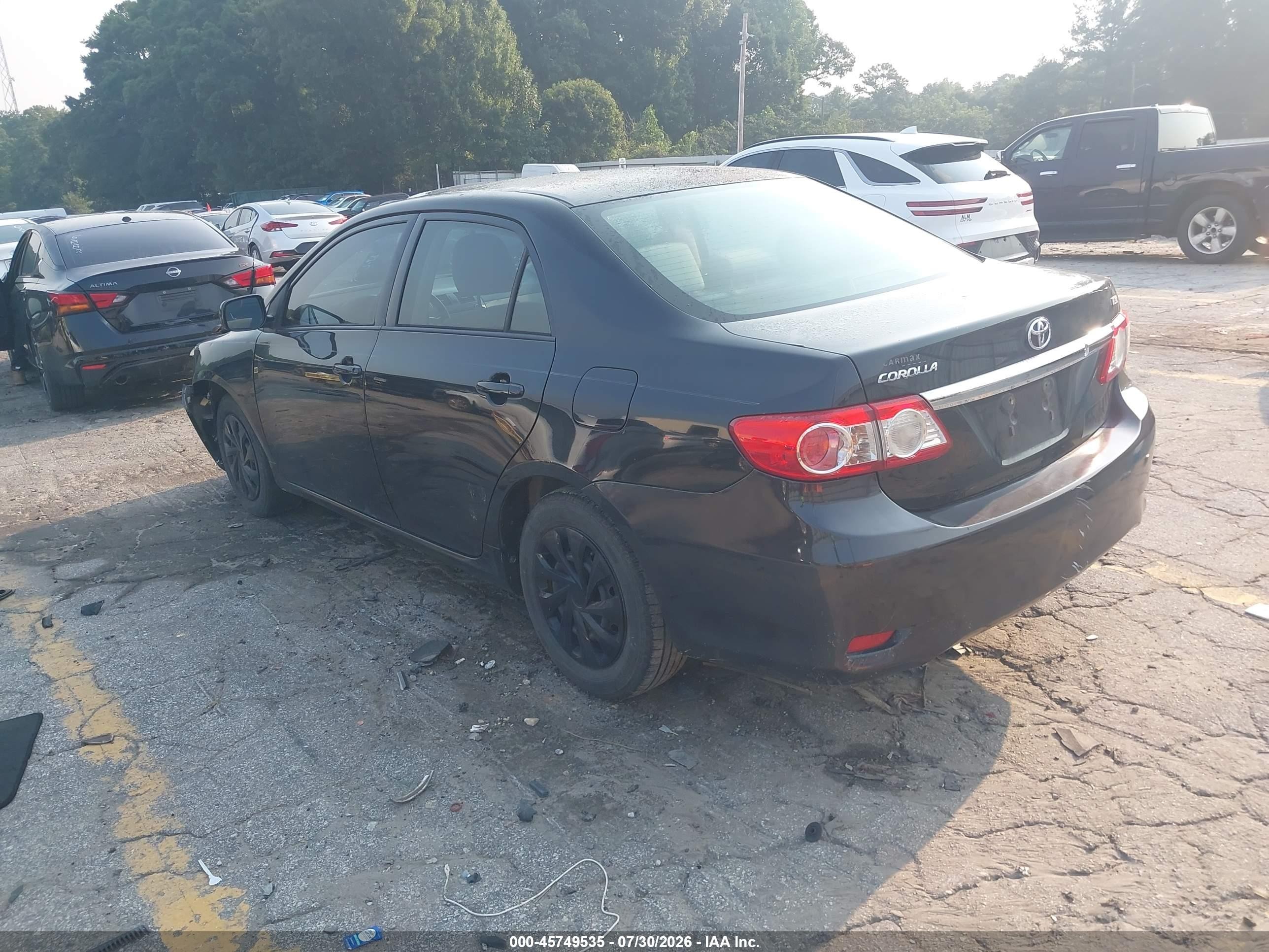2011 Toyota Corolla Le Black vin: JTDBU4EEXBJ101570