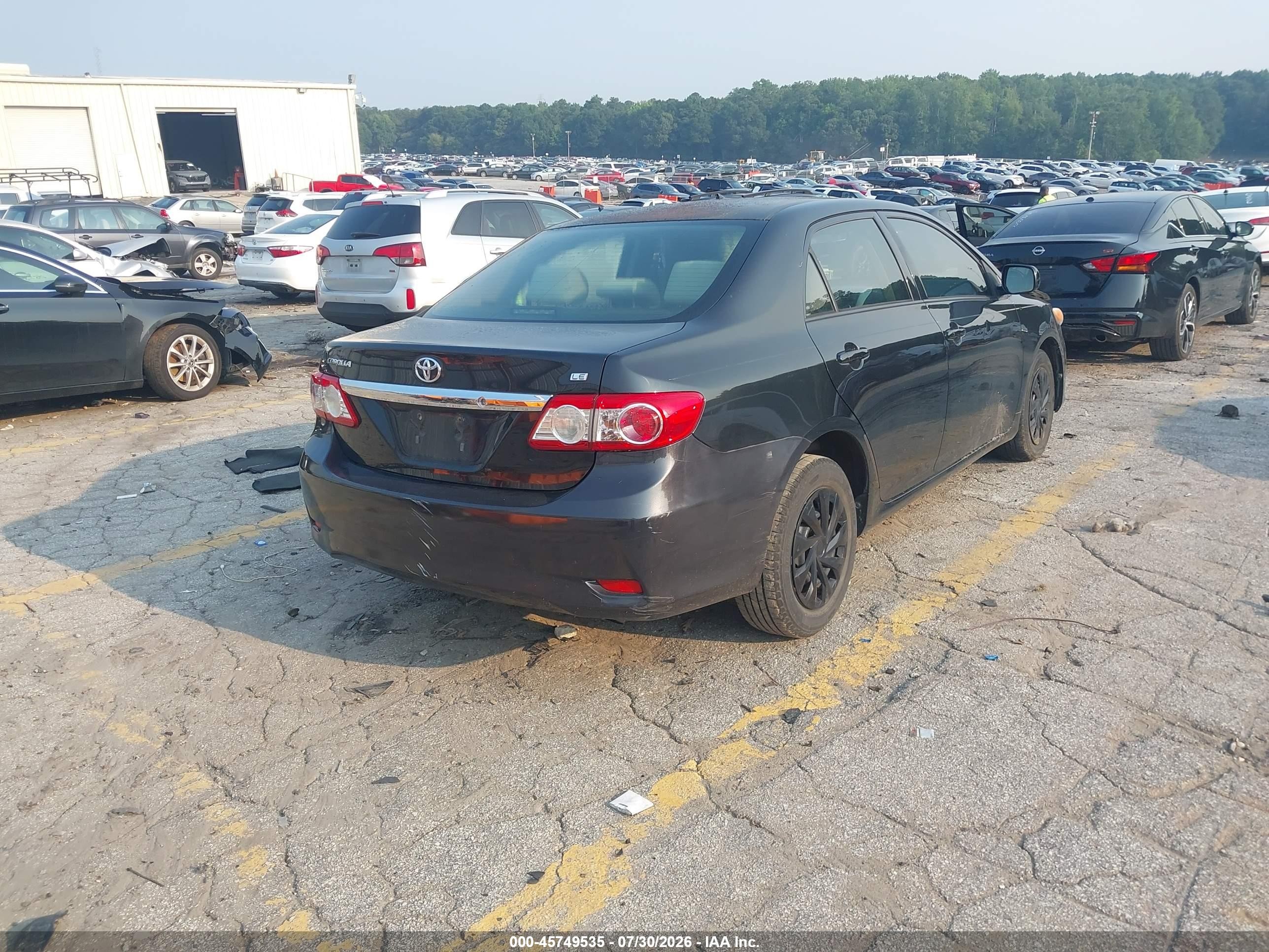 2011 Toyota Corolla Le Black vin: JTDBU4EEXBJ101570