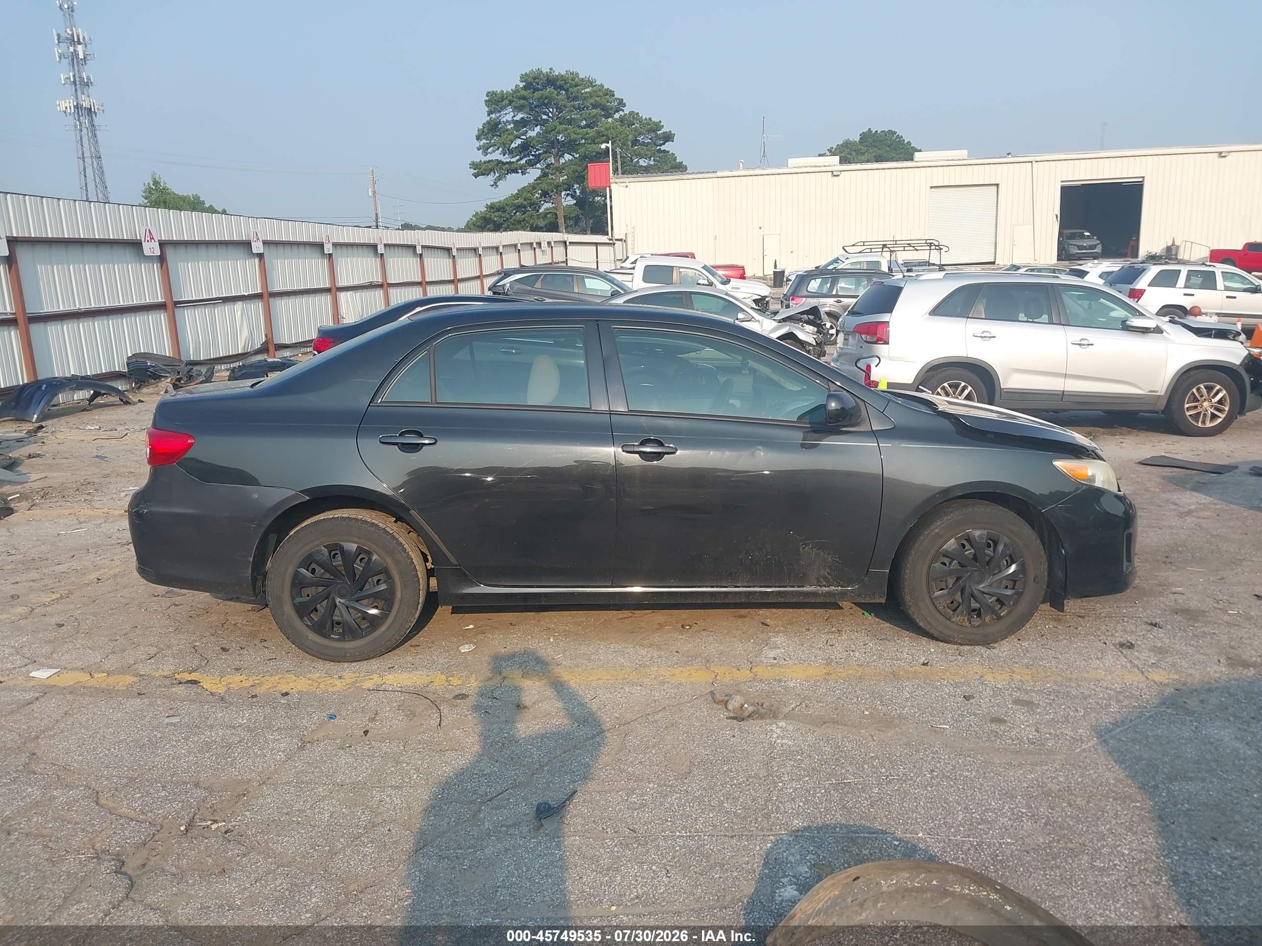 2011 Toyota Corolla Le Black vin: JTDBU4EEXBJ101570
