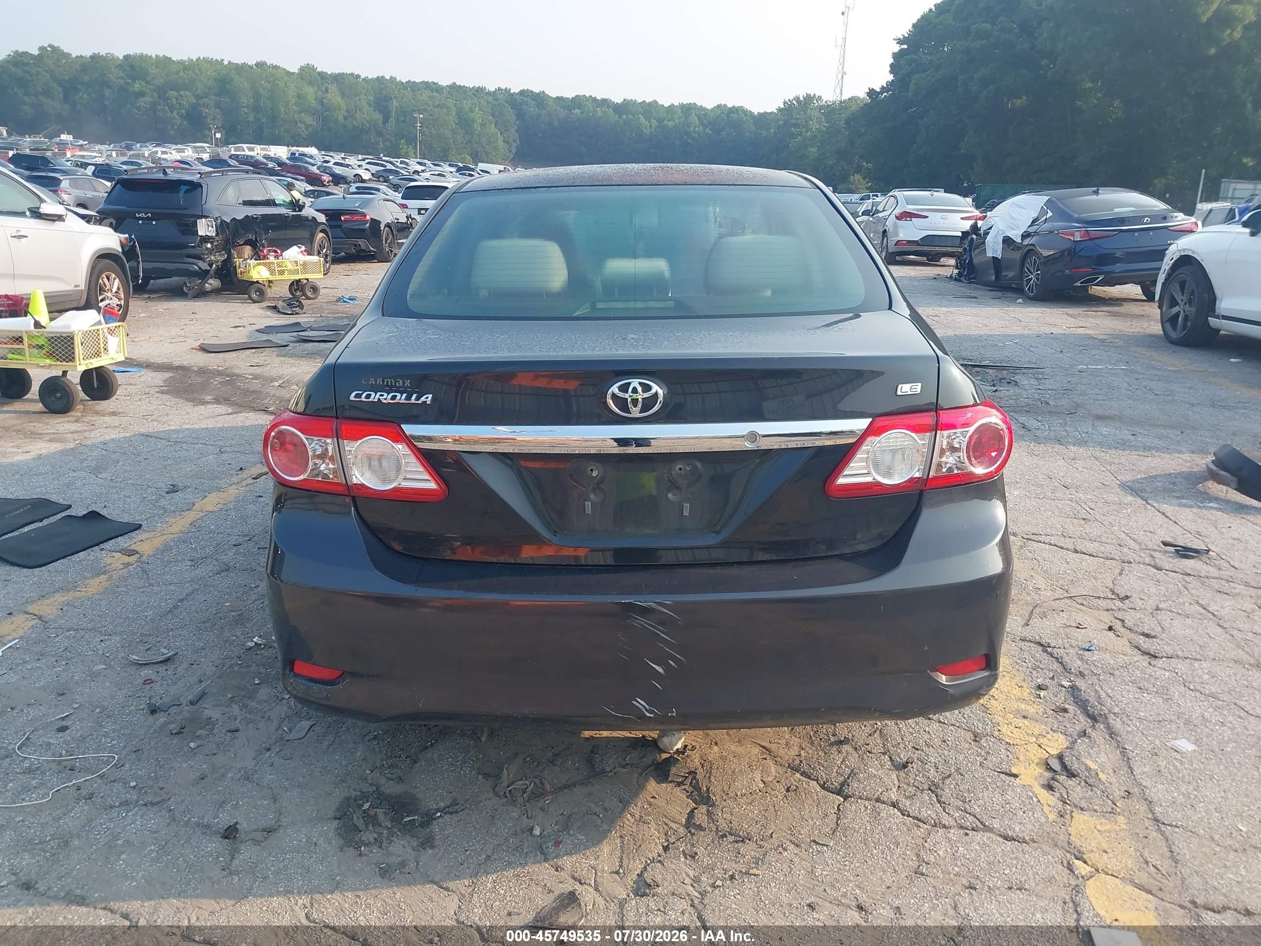 2011 Toyota Corolla Le Black vin: JTDBU4EEXBJ101570