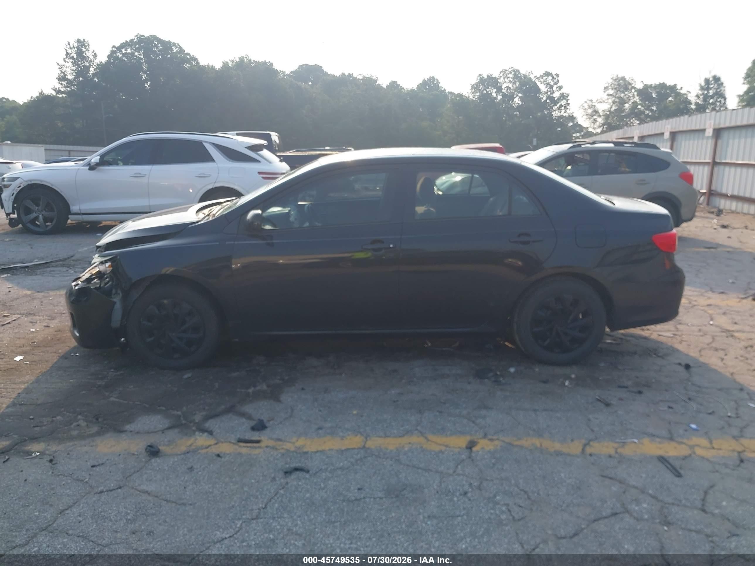 2011 Toyota Corolla Le Black vin: JTDBU4EEXBJ101570