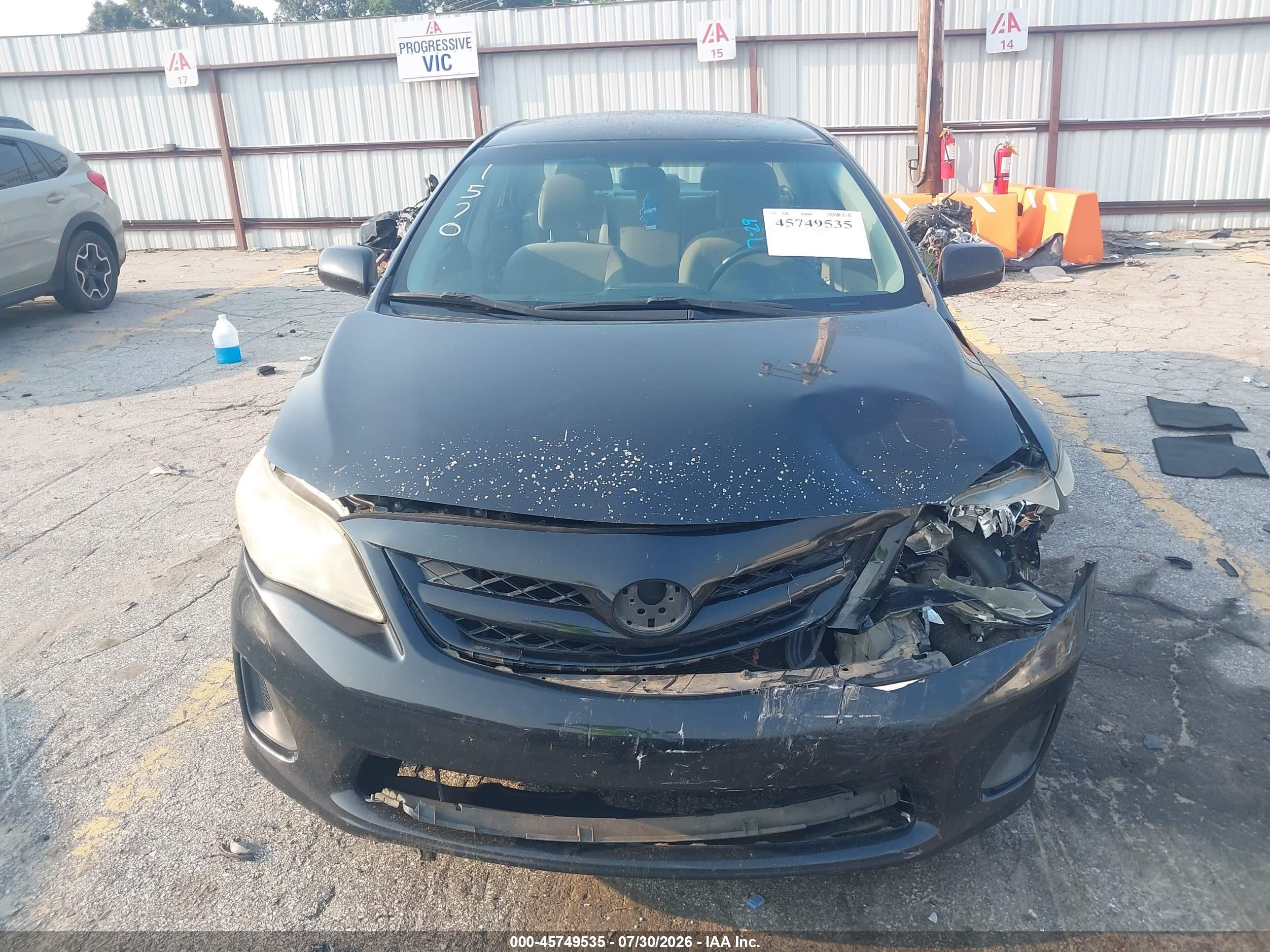 2011 Toyota Corolla Le Black vin: JTDBU4EEXBJ101570
