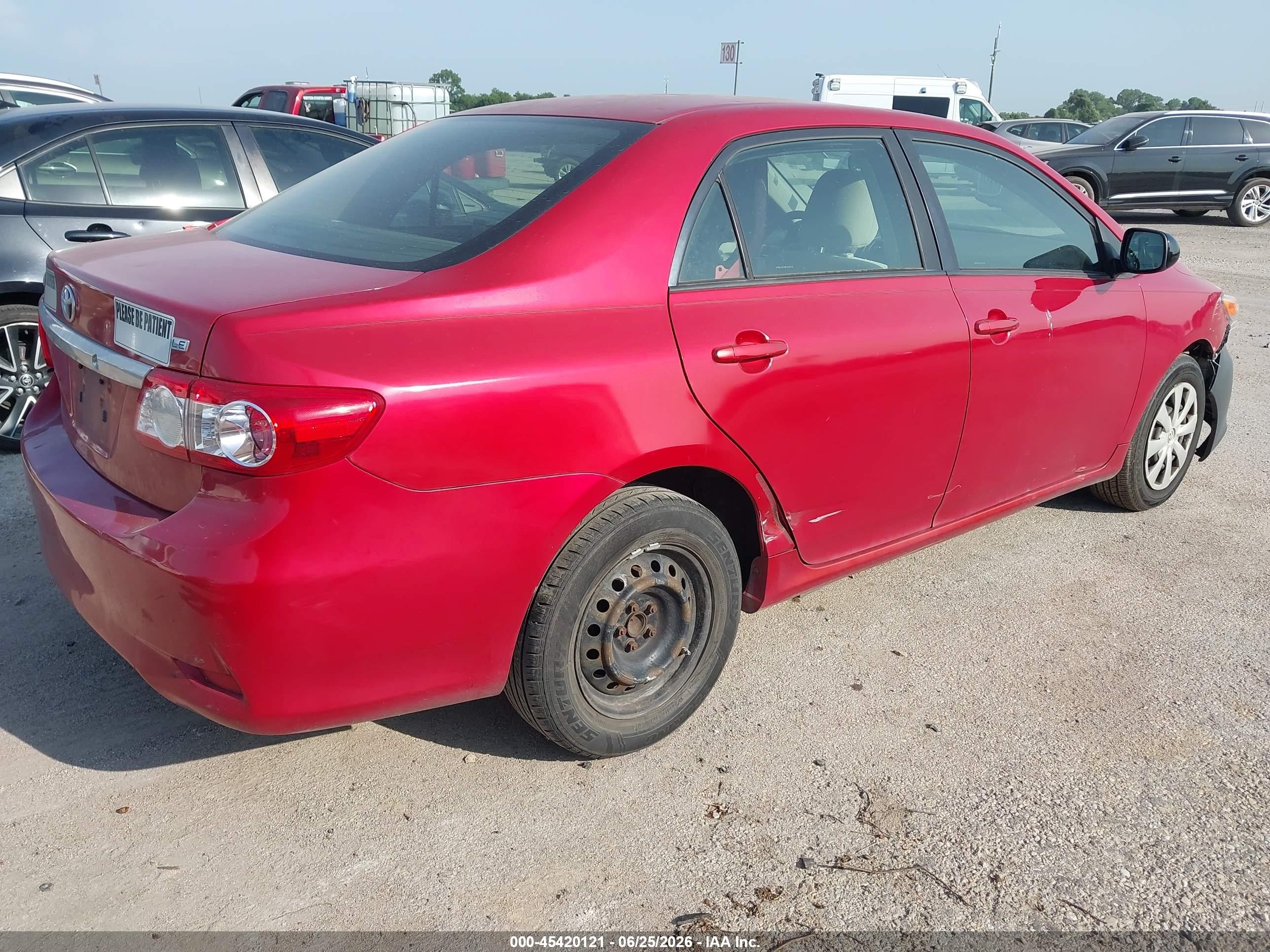 2011 Toyota Corolla Le Red vin: JTDBU4EEXBJ102492