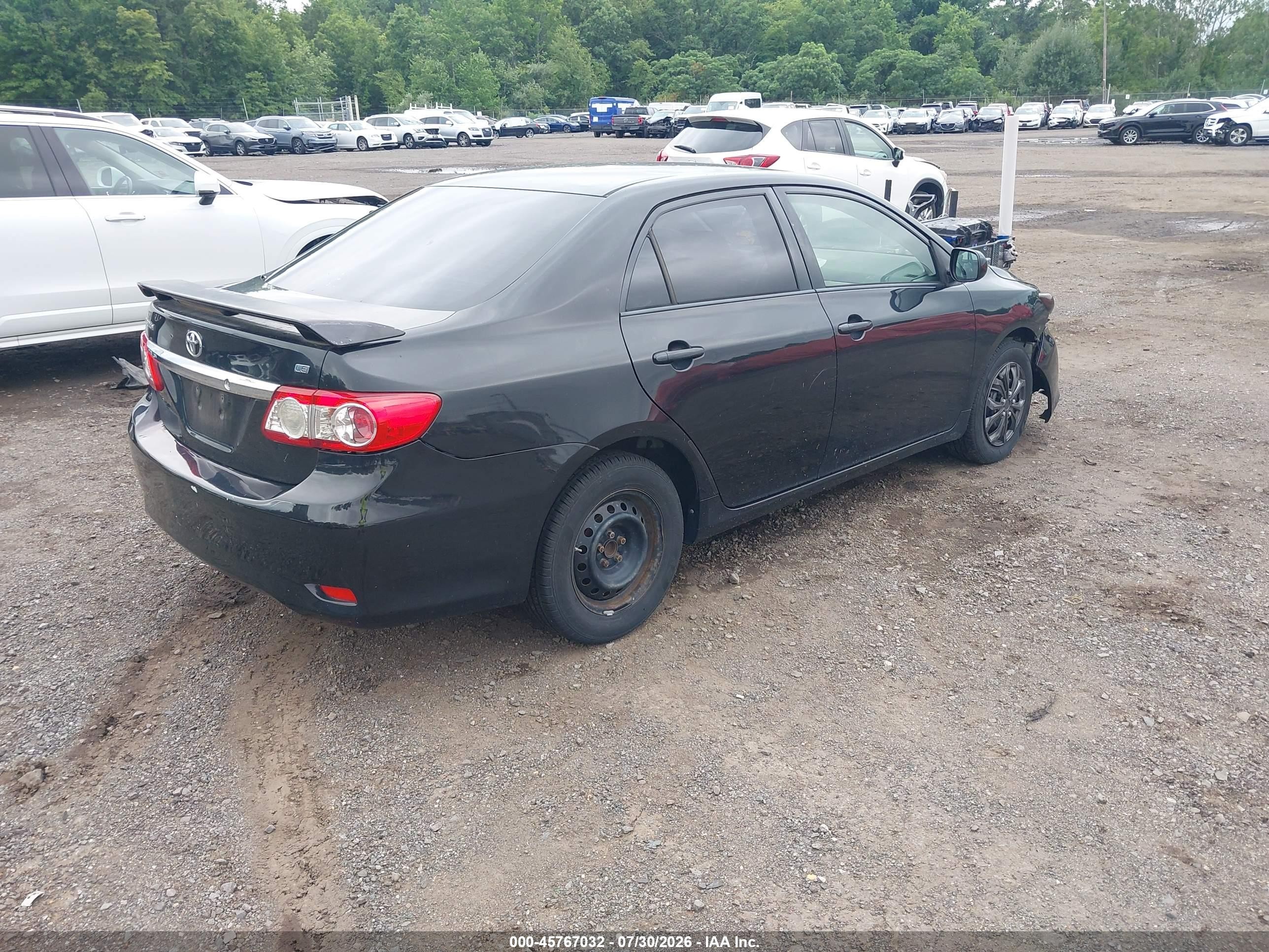 2011 Toyota Corolla Le Black vin: JTDBU4EEXBJ108681