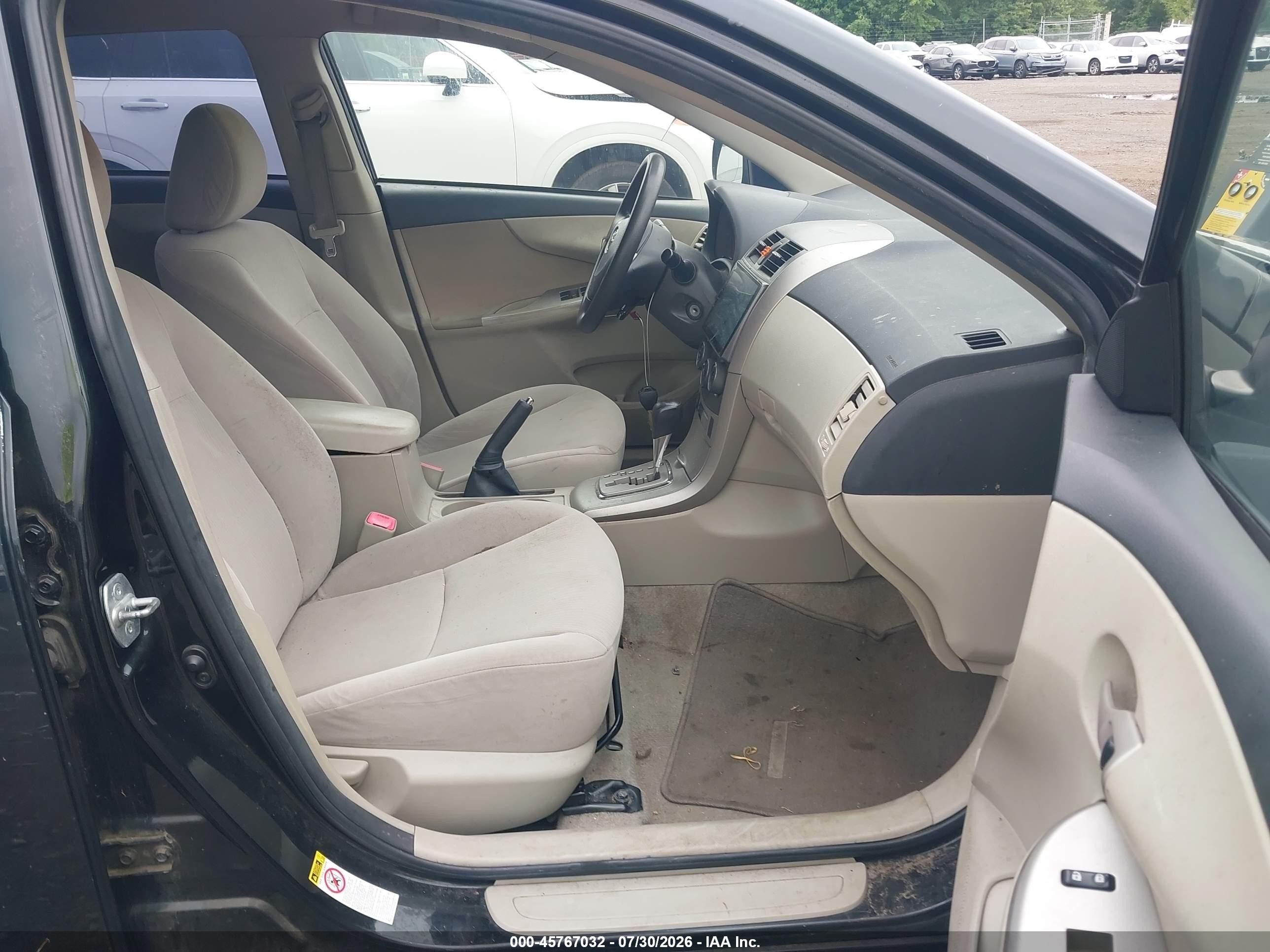 2011 Toyota Corolla Le Black vin: JTDBU4EEXBJ108681