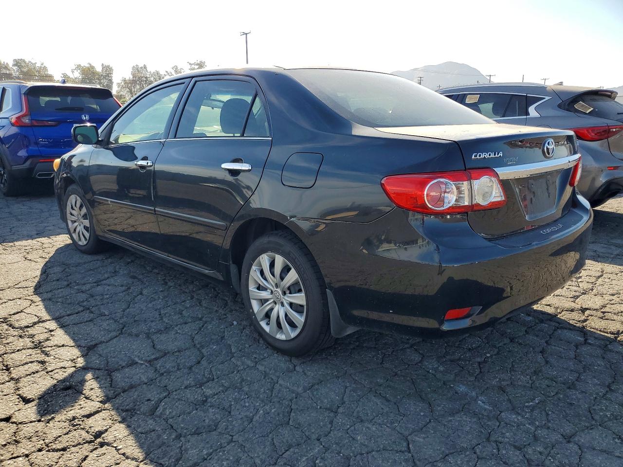 2013 Toyota Corolla Le Black vin: JTDBU4EEXDJ119392