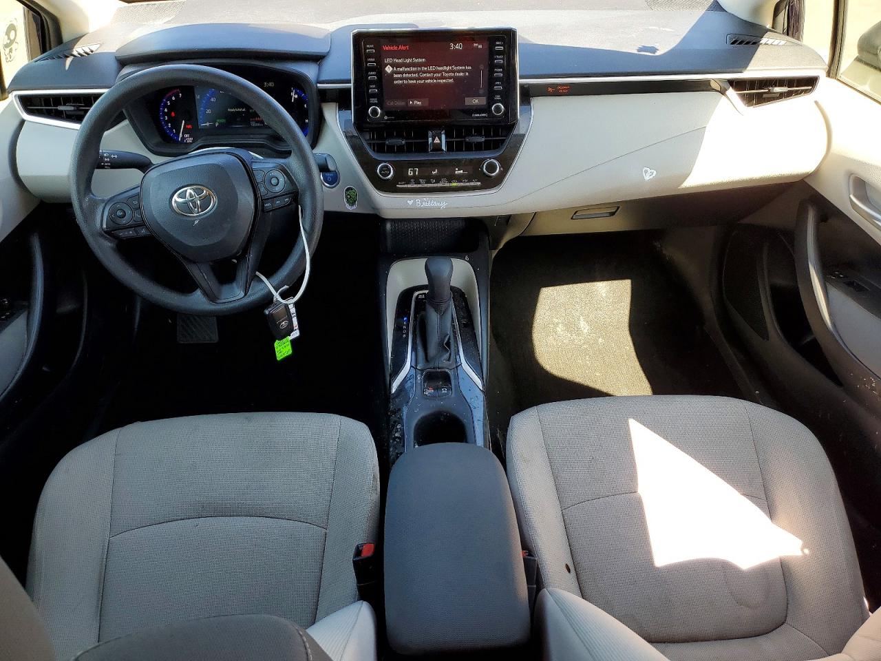 2021 Toyota Corolla Le Purple vin: JTDEAMDE4MJ033065
