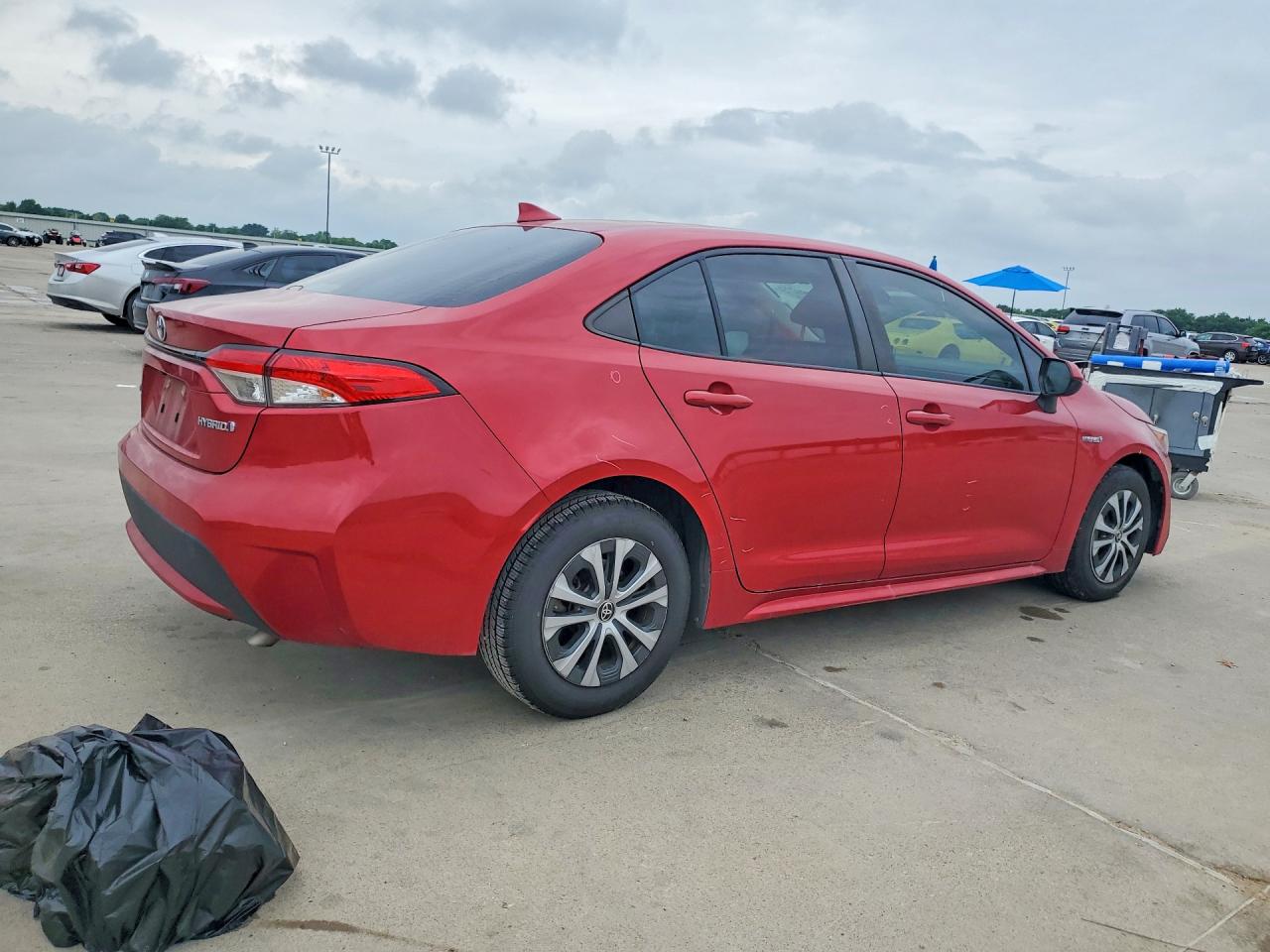 2021 Toyota Corolla Le Red vin: JTDEAMDE5MJ012239