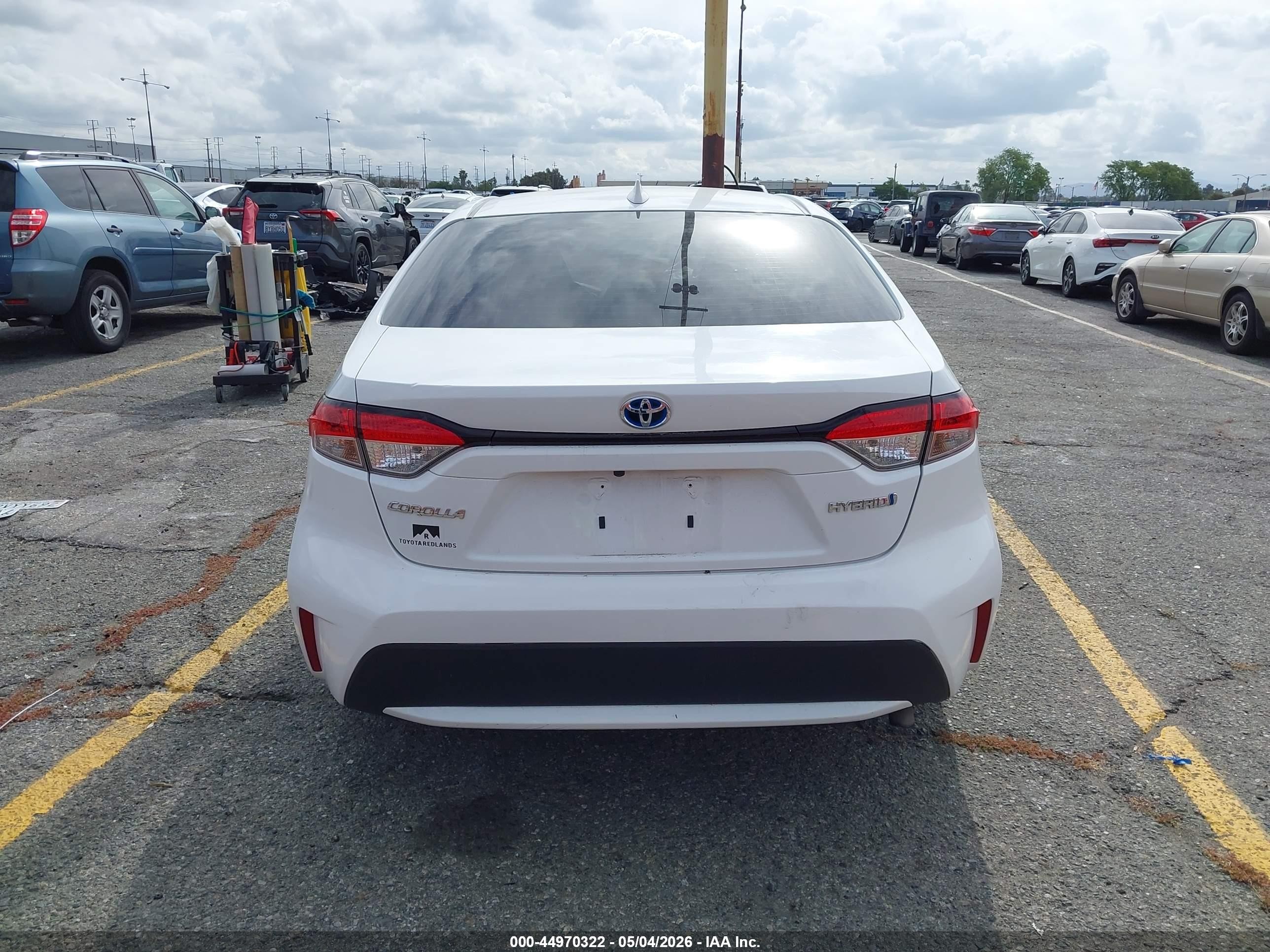 2021 Toyota Corolla Hybrid Le White vin: JTDEAMDE5MJ032927