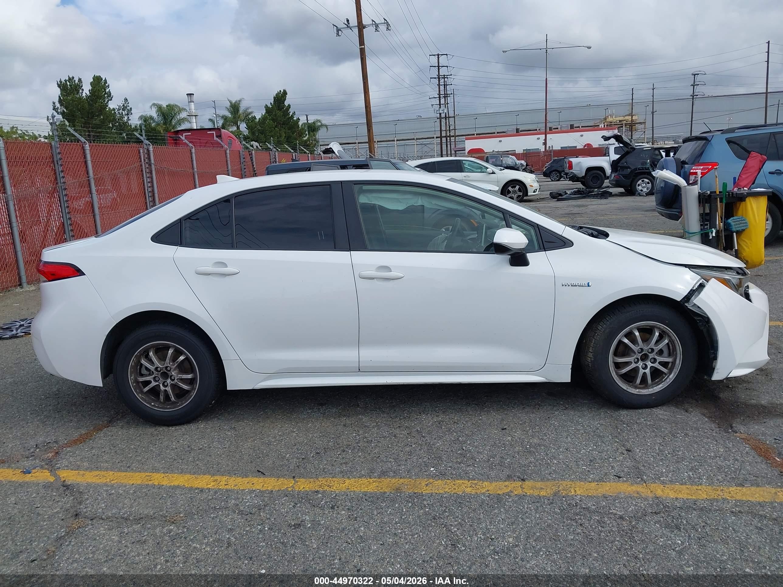 2021 Toyota Corolla Hybrid Le White vin: JTDEAMDE5MJ032927