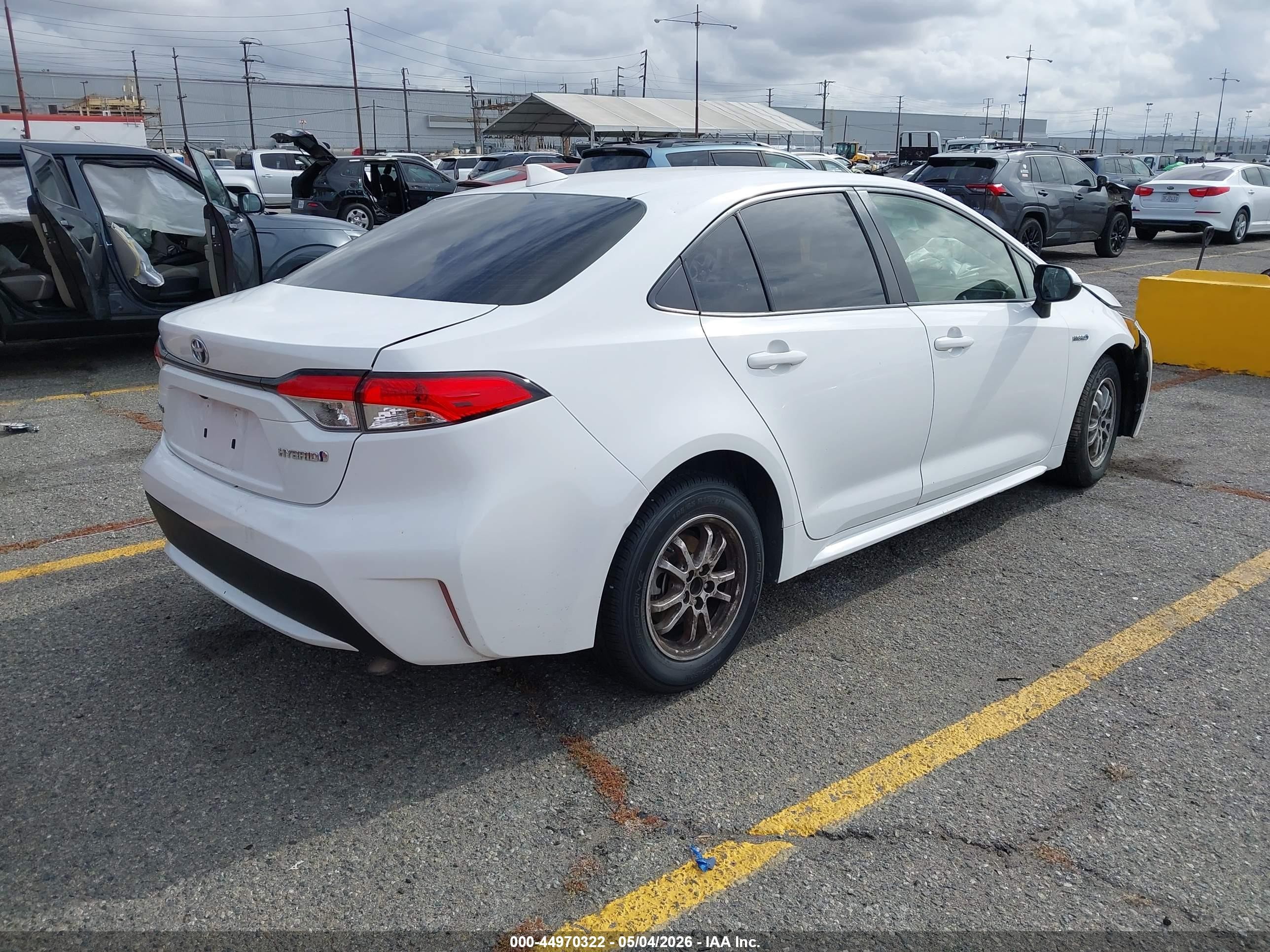 2021 Toyota Corolla Hybrid Le White vin: JTDEAMDE5MJ032927