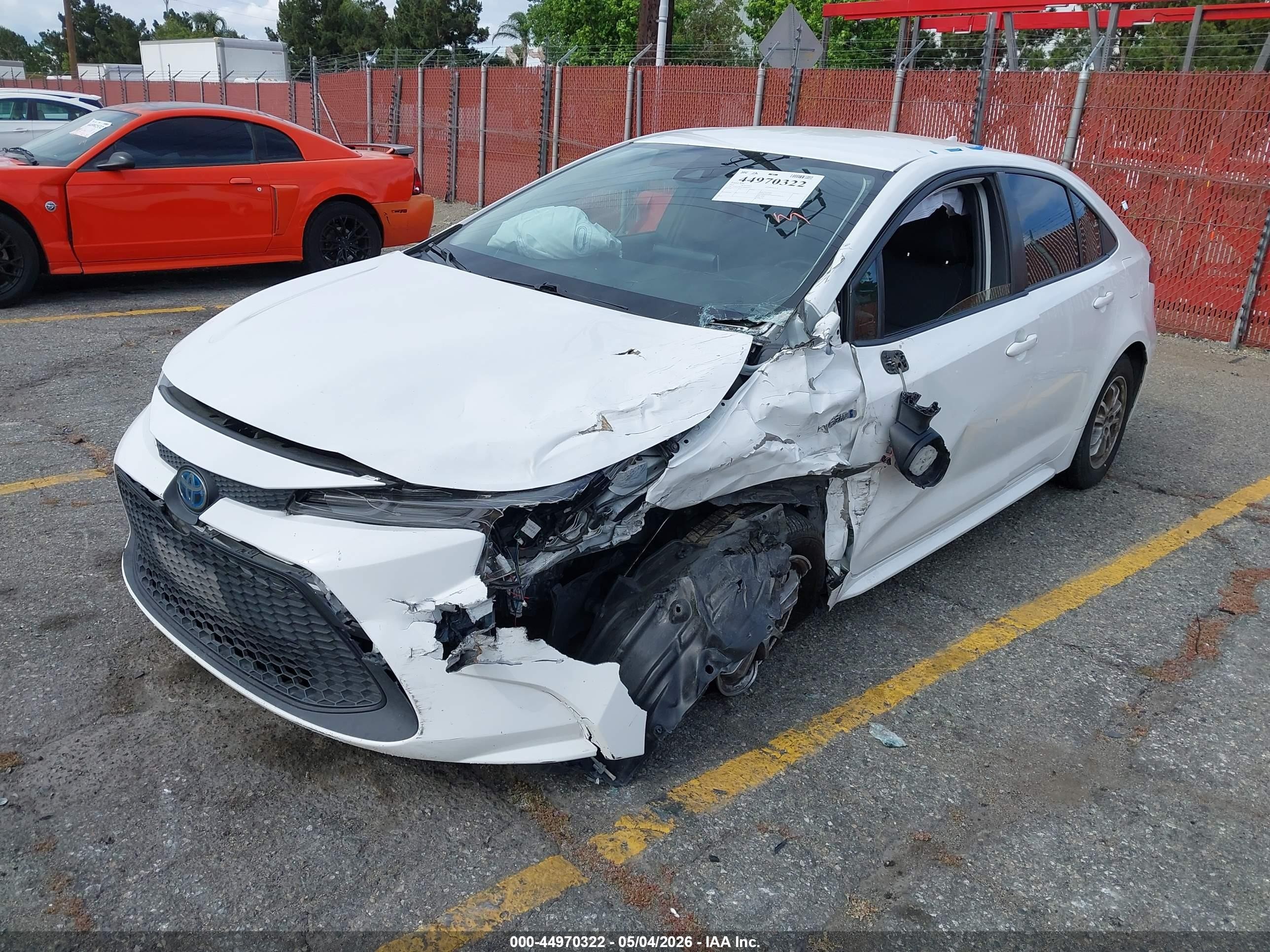 2021 Toyota Corolla Hybrid Le White vin: JTDEAMDE5MJ032927