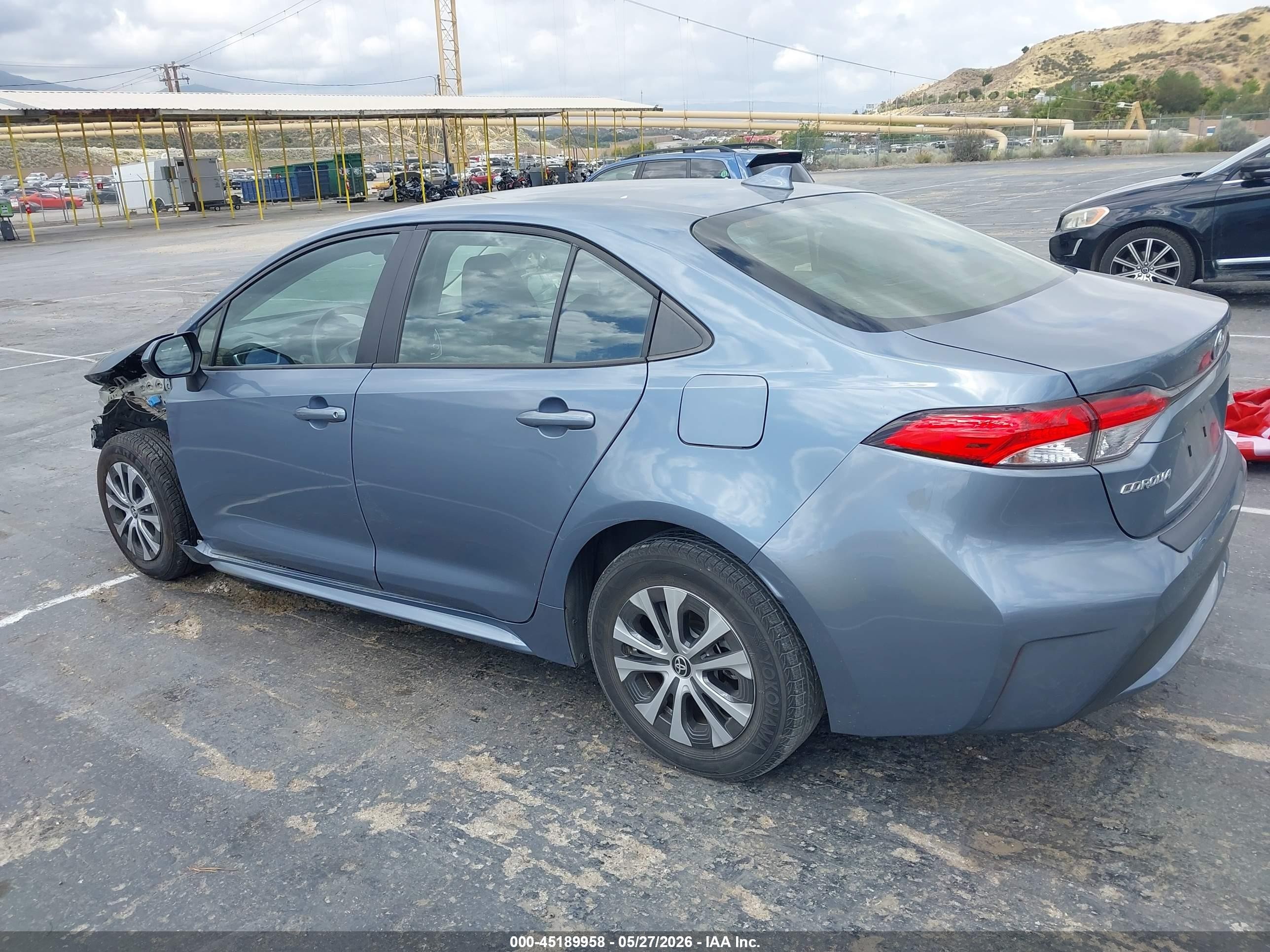 2021 Toyota Corolla Hybrid Le Blue vin: JTDEAMDE7MJ033139