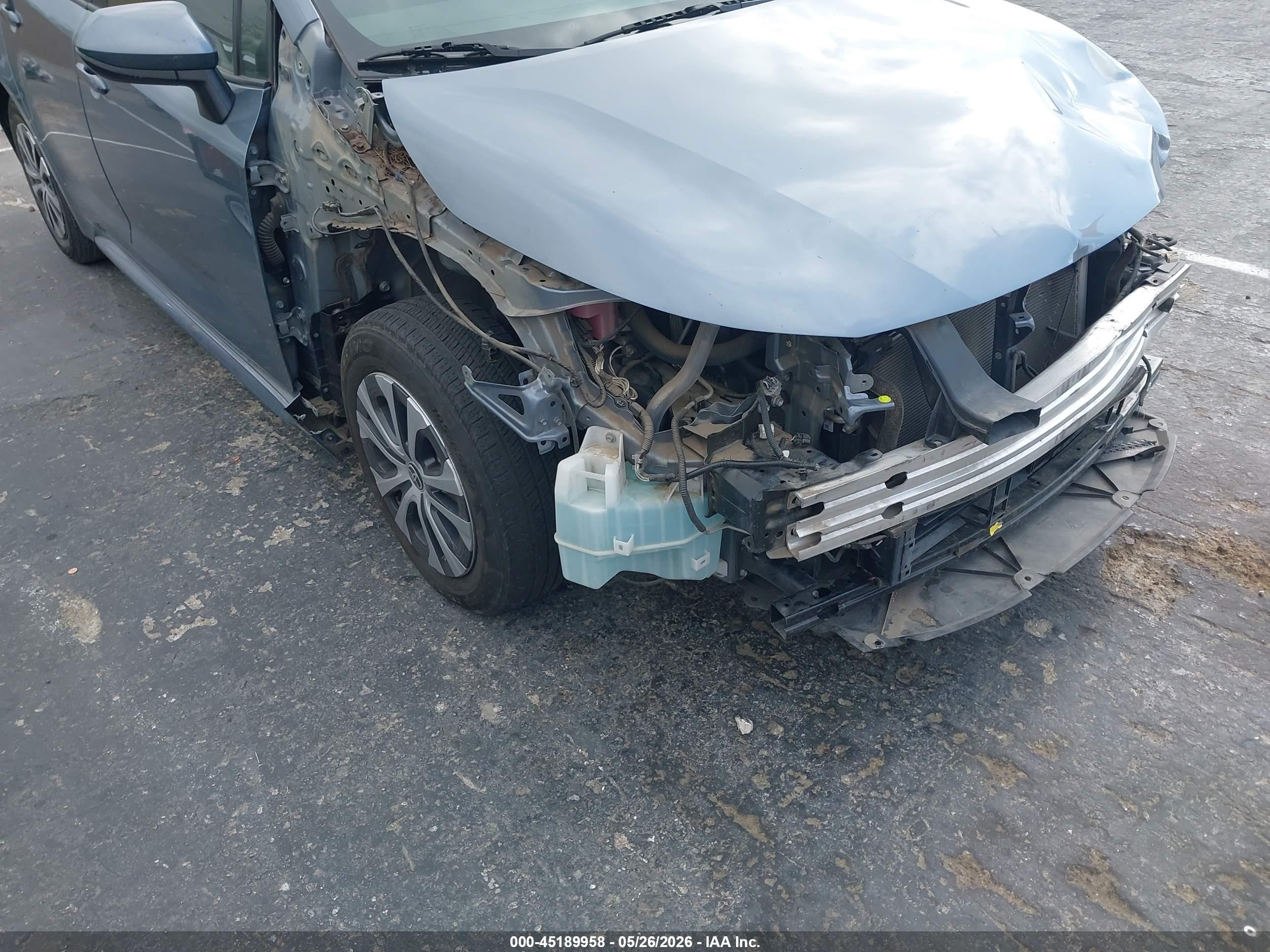 2021 Toyota Corolla Hybrid Le Blue vin: JTDEAMDE7MJ033139
