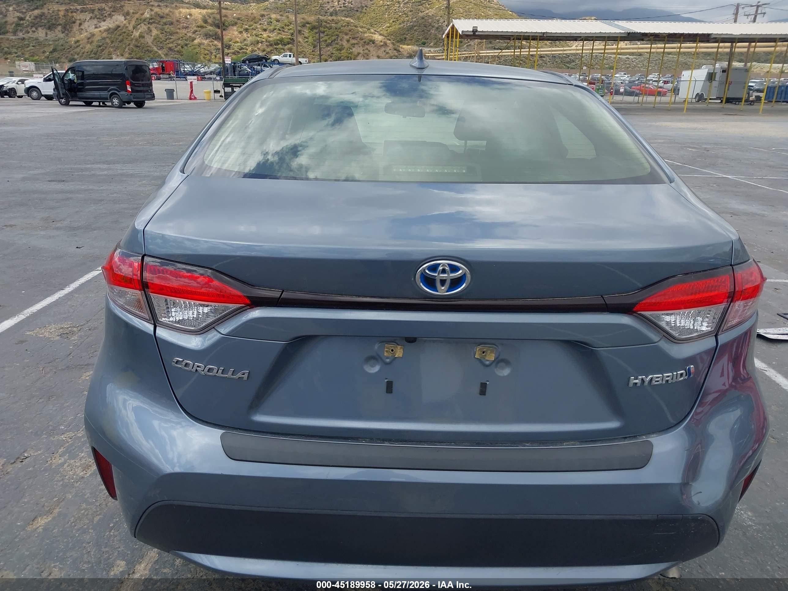 2021 Toyota Corolla Hybrid Le Blue vin: JTDEAMDE7MJ033139
