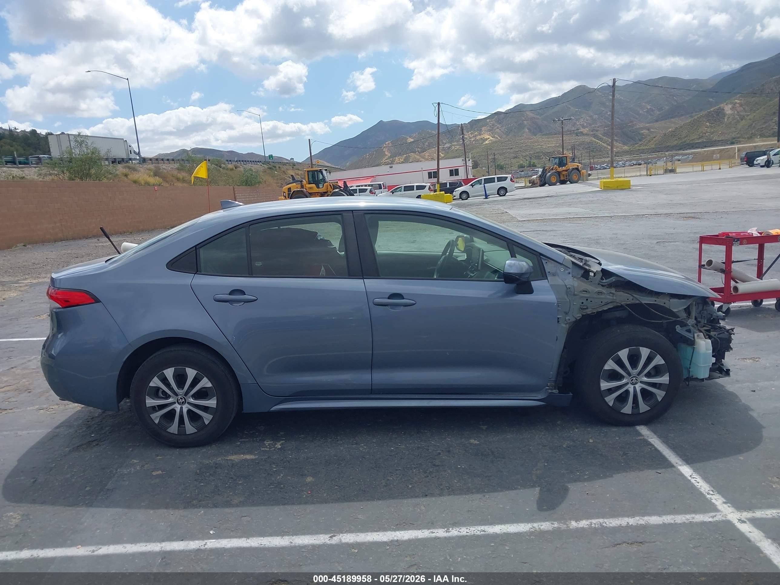 2021 Toyota Corolla Hybrid Le Blue vin: JTDEAMDE7MJ033139